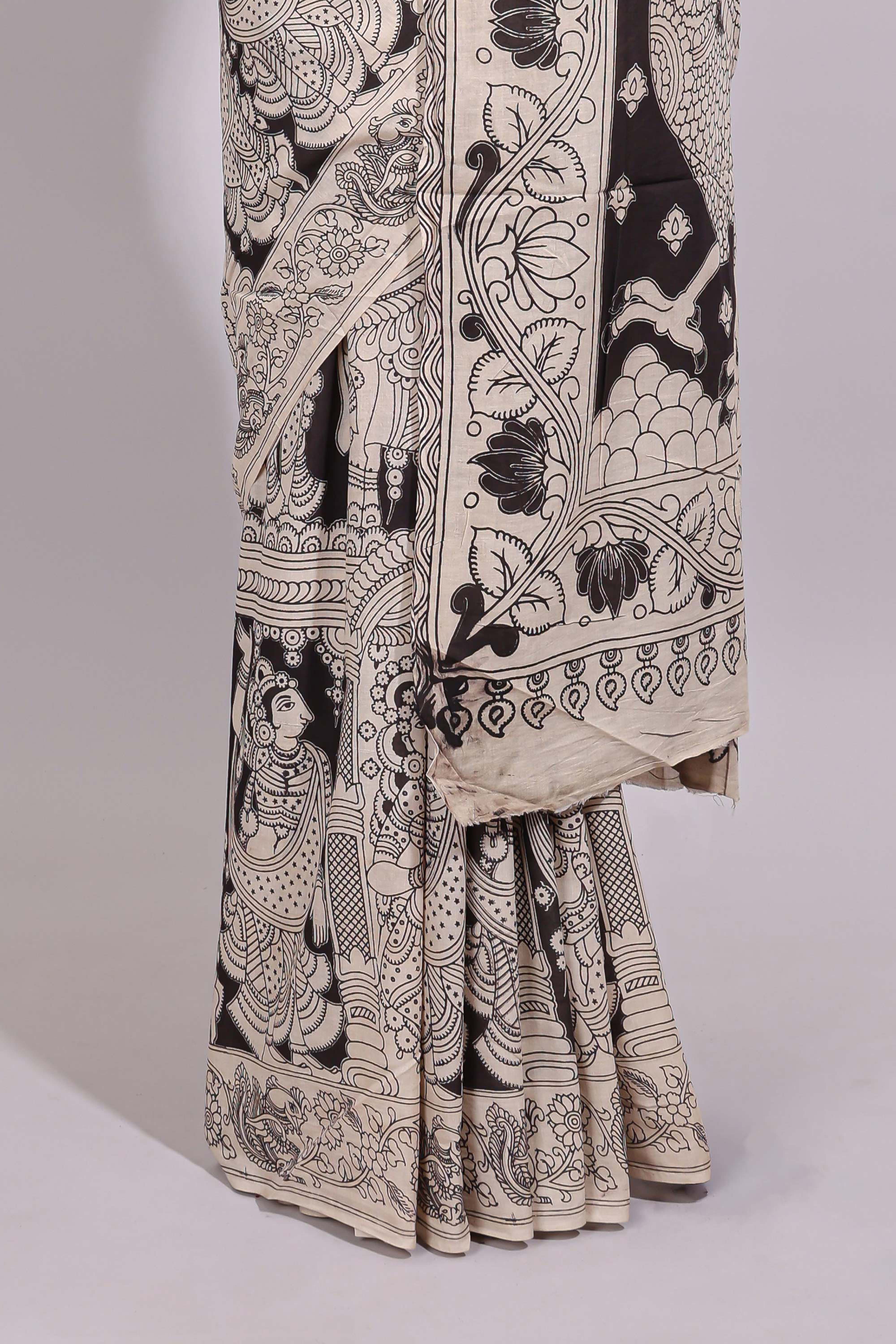 Black hand painted peacock & floral design kalamkari cotton saree with contrast border and floral printed blouse