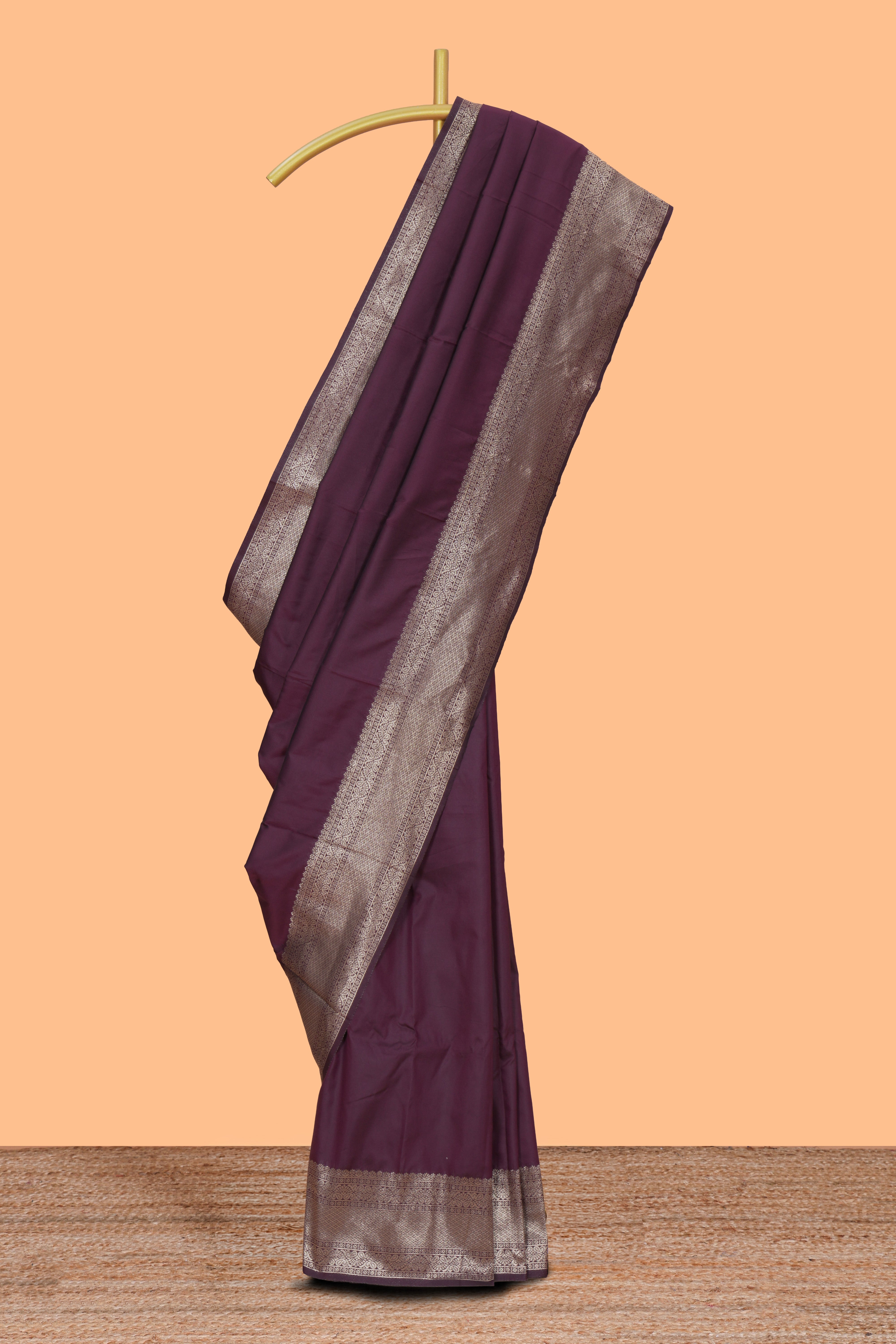 Deep purple plain kathan silk saree with self zari border and motifs blouse