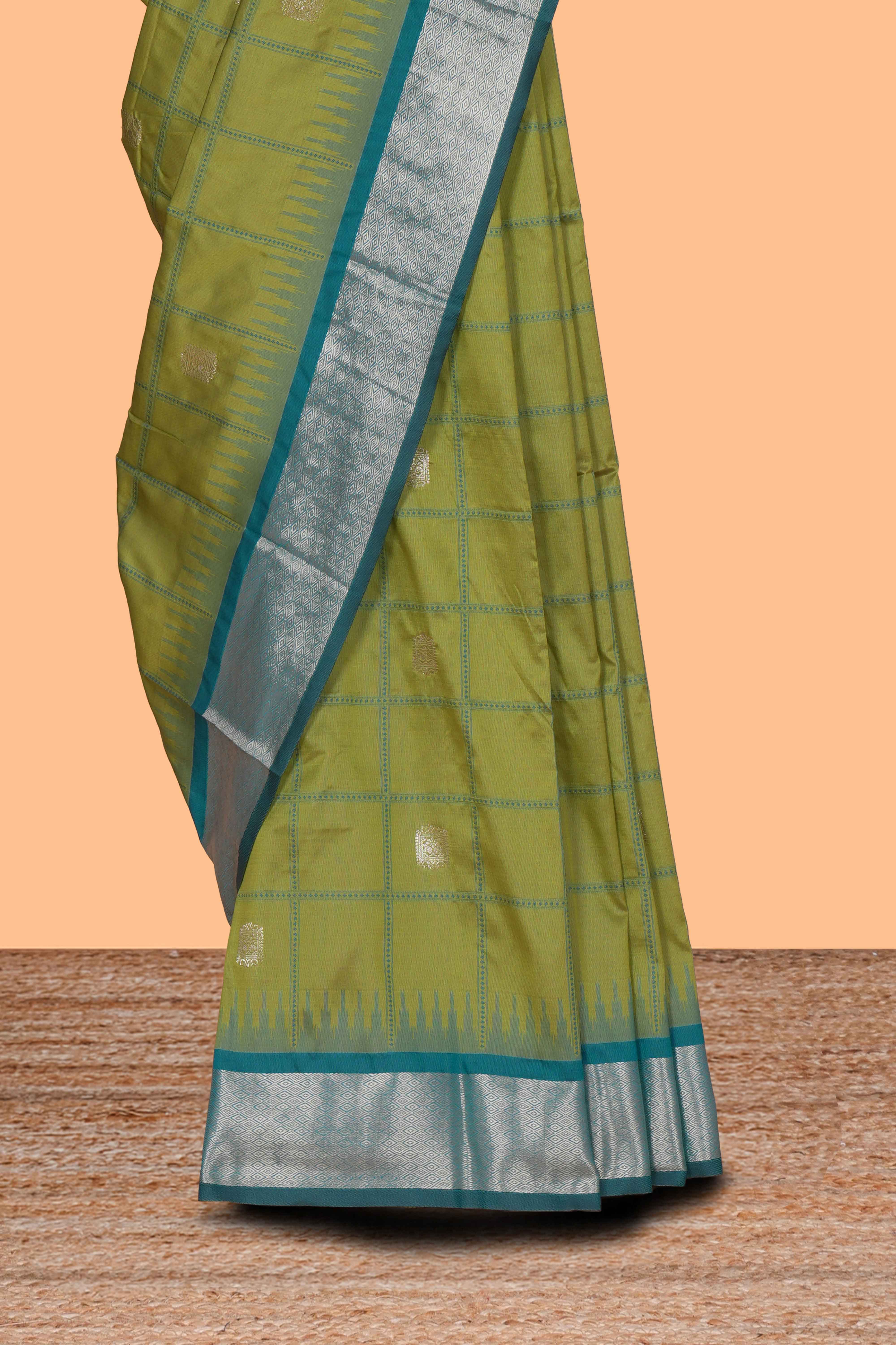 Green checked zari design kathan silk saree with contrast temple zari border and motifs blouse