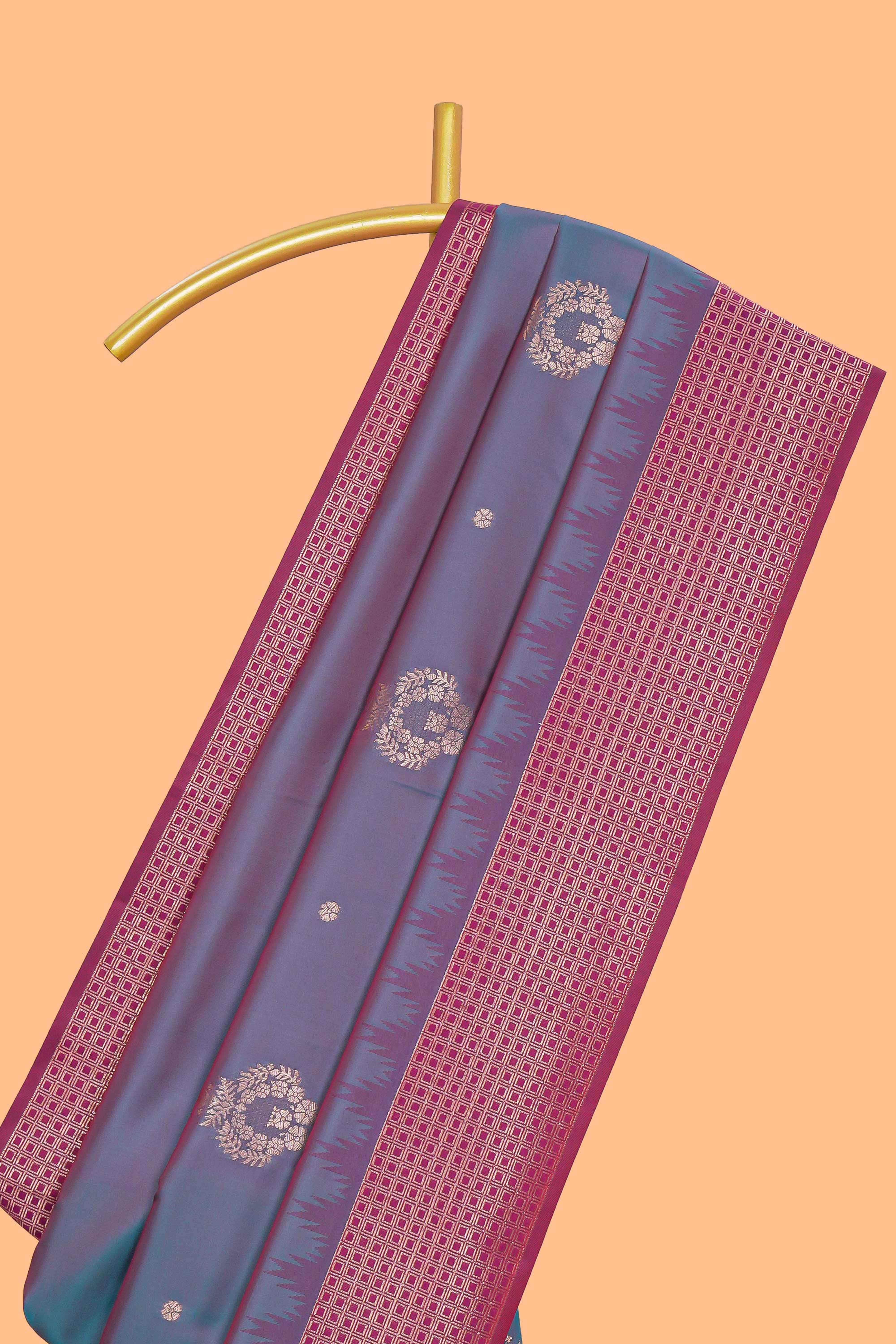Dual tone teal blue and magenta kathan silk saree with contrast zari borders and motifs blouse