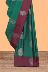 Green zari motifs design kathan silk saree with contrast zari borders and motifs blouse