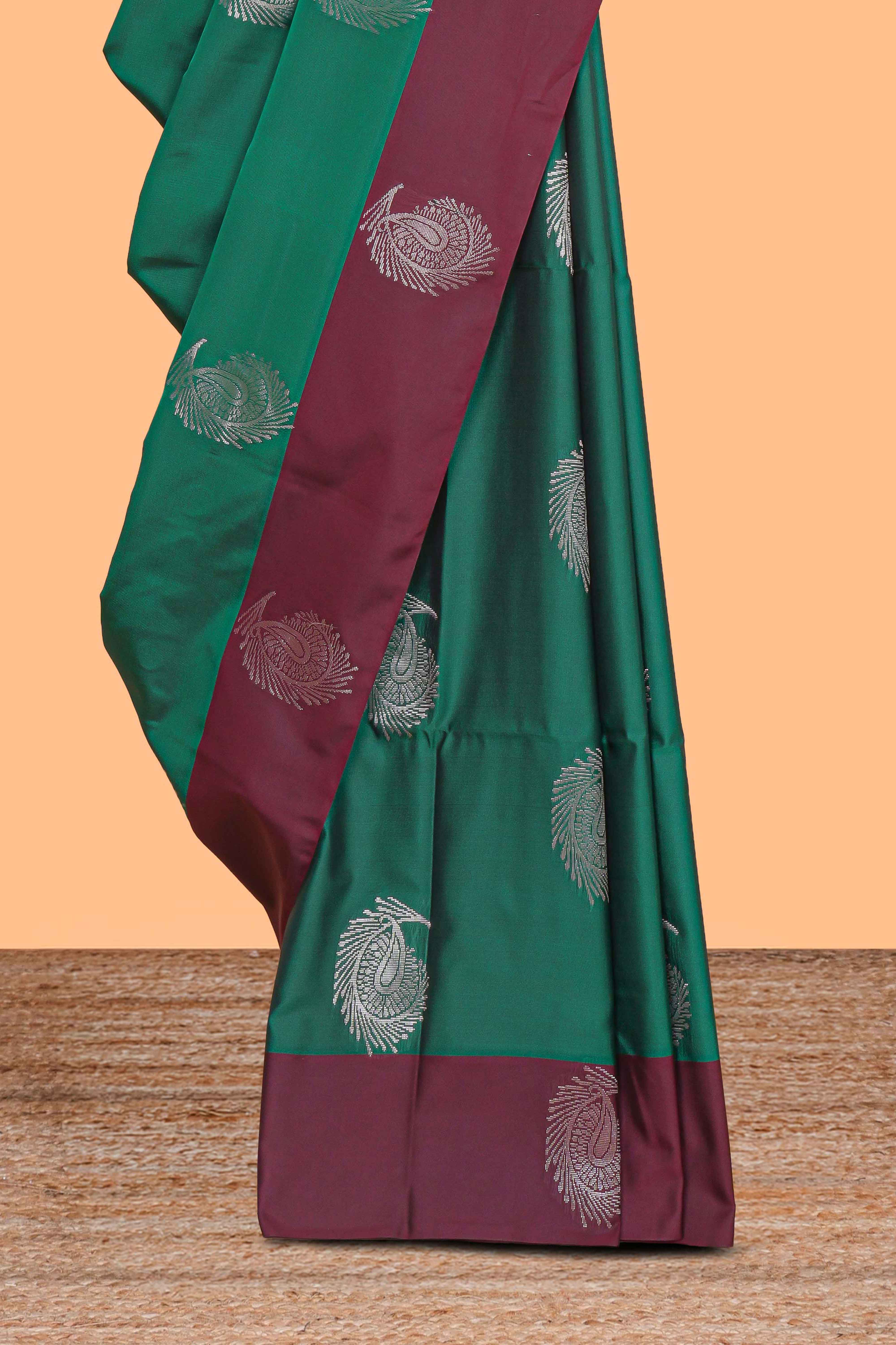 Green zari motifs design kathan silk saree with contrast zari borders and motifs blouse
