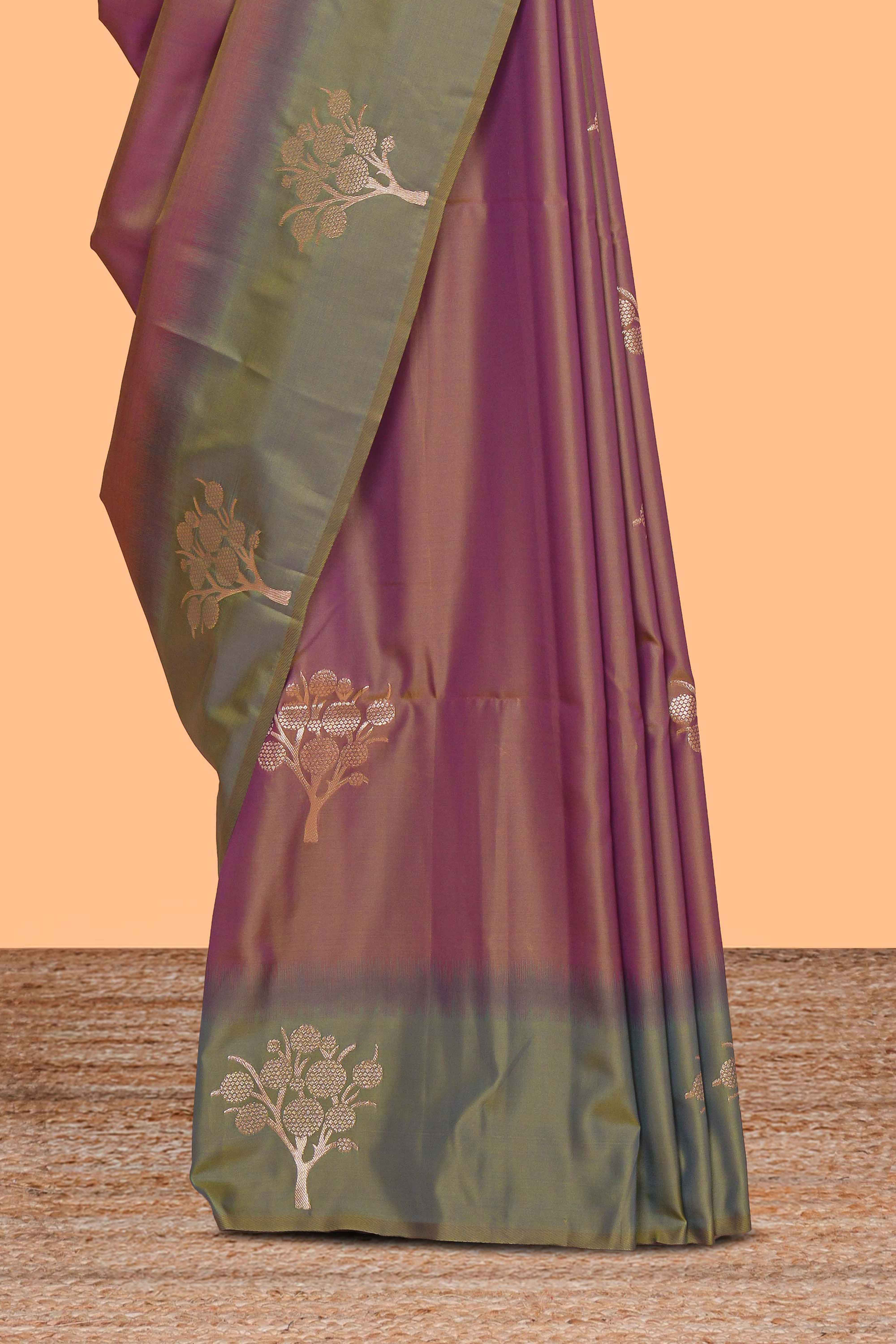 Deep ruby purple floral design kathan silk saree with contrast zari borders and motifs blouse
