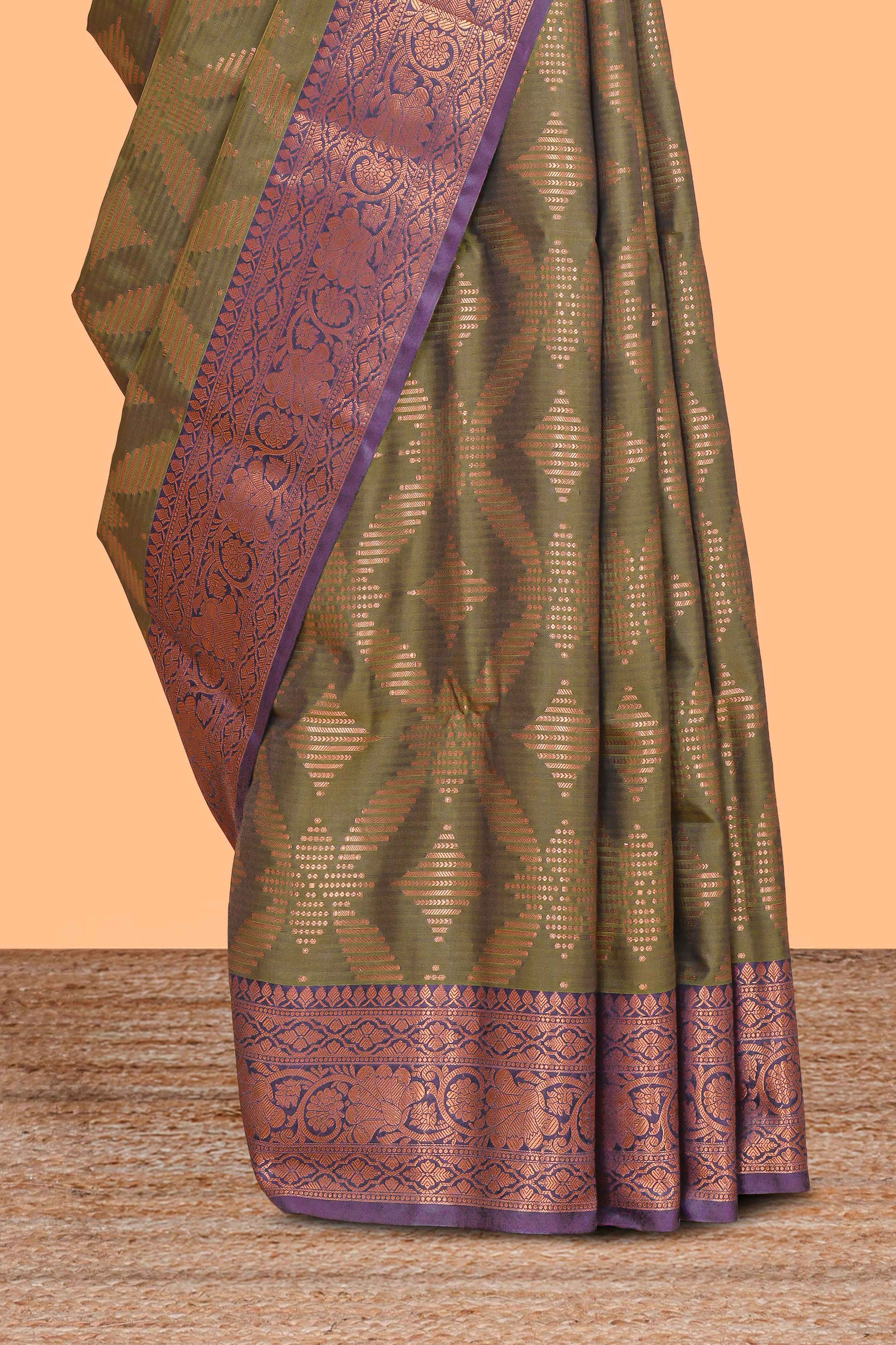 Green geometric zari design kathan silk saree with contrast zari borders and embroidery blouse