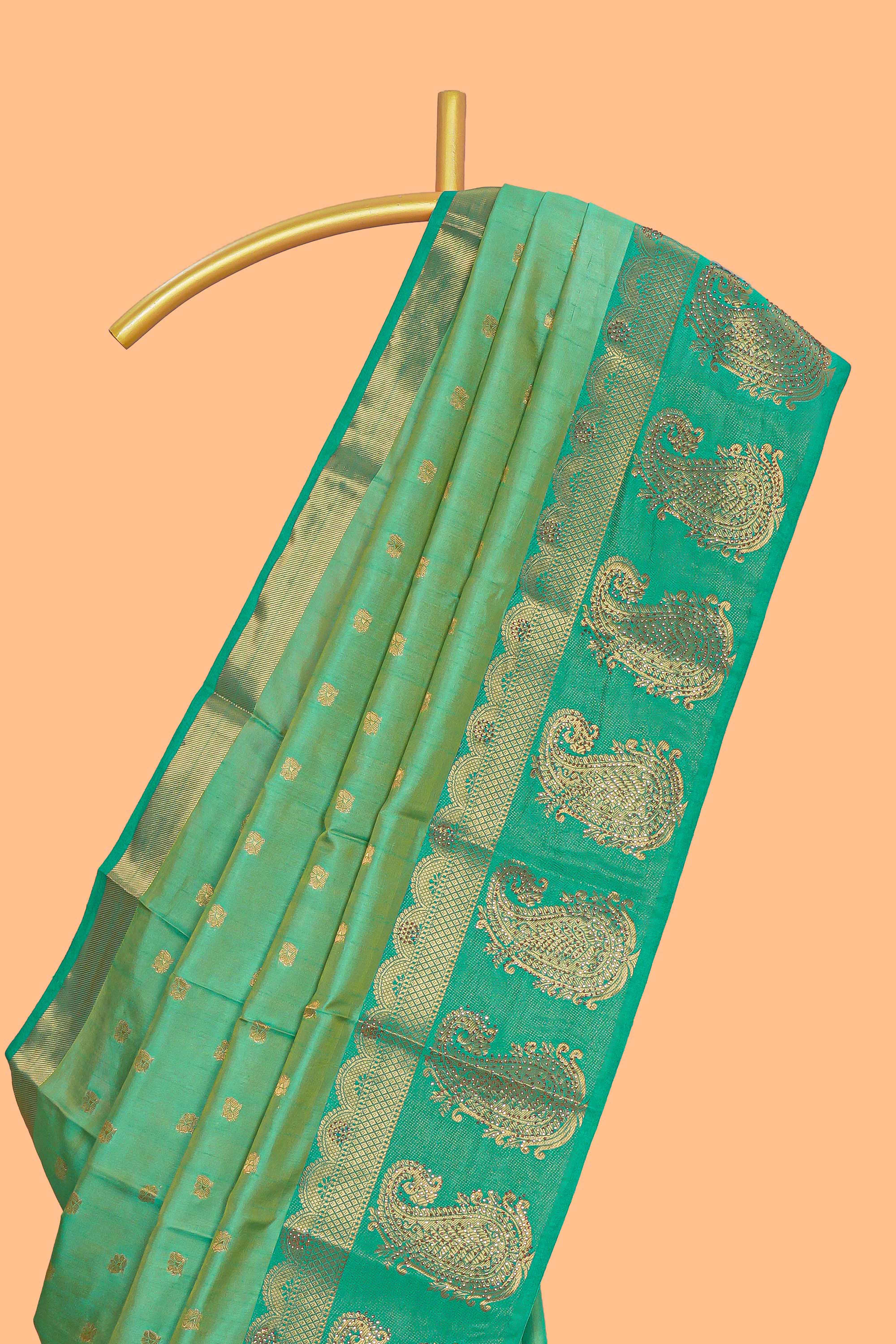 Green floral motifs zari design kathan silk saree with contrast zari borders and motifs blouse