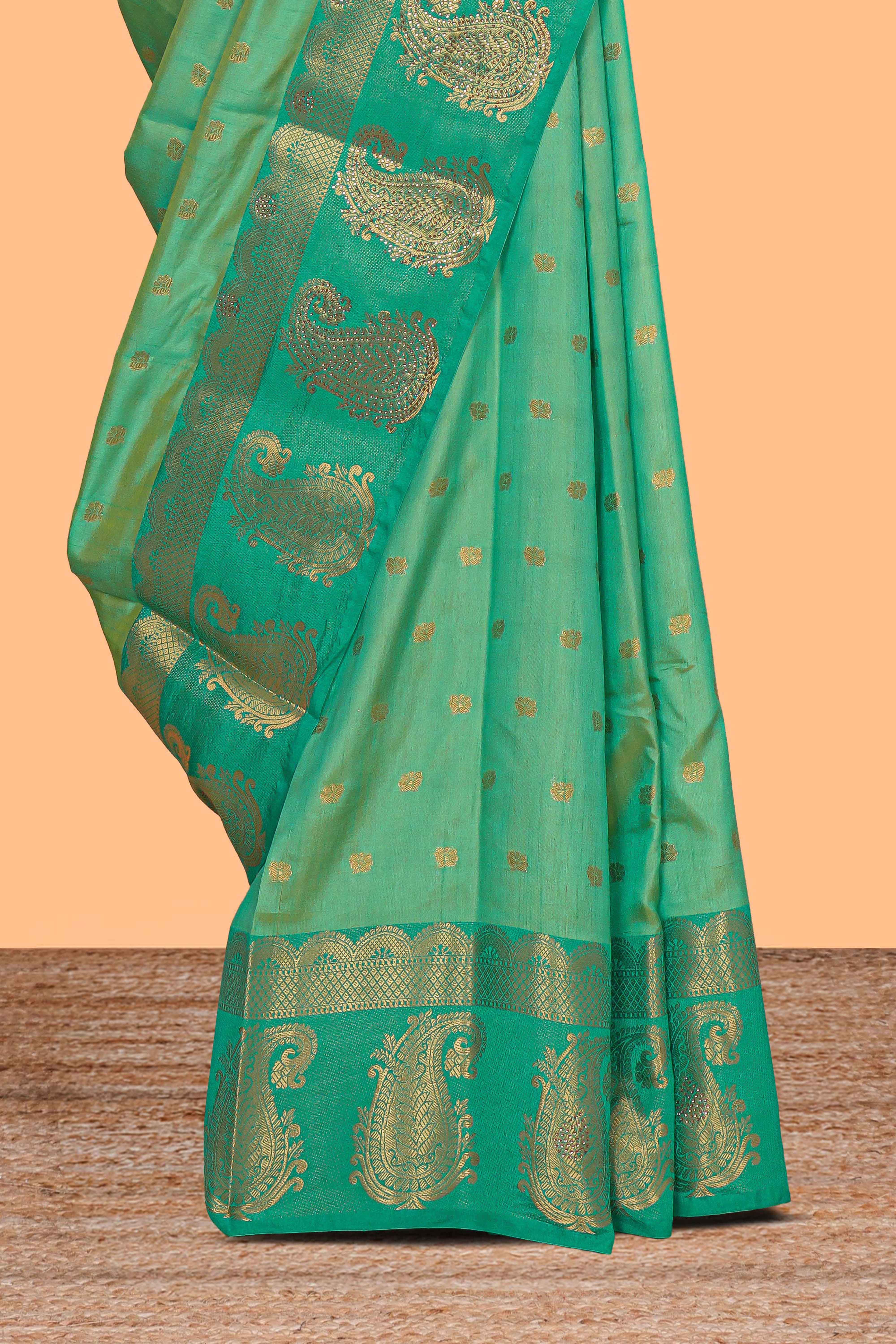 Green floral motifs zari design kathan silk saree with contrast zari borders and motifs blouse