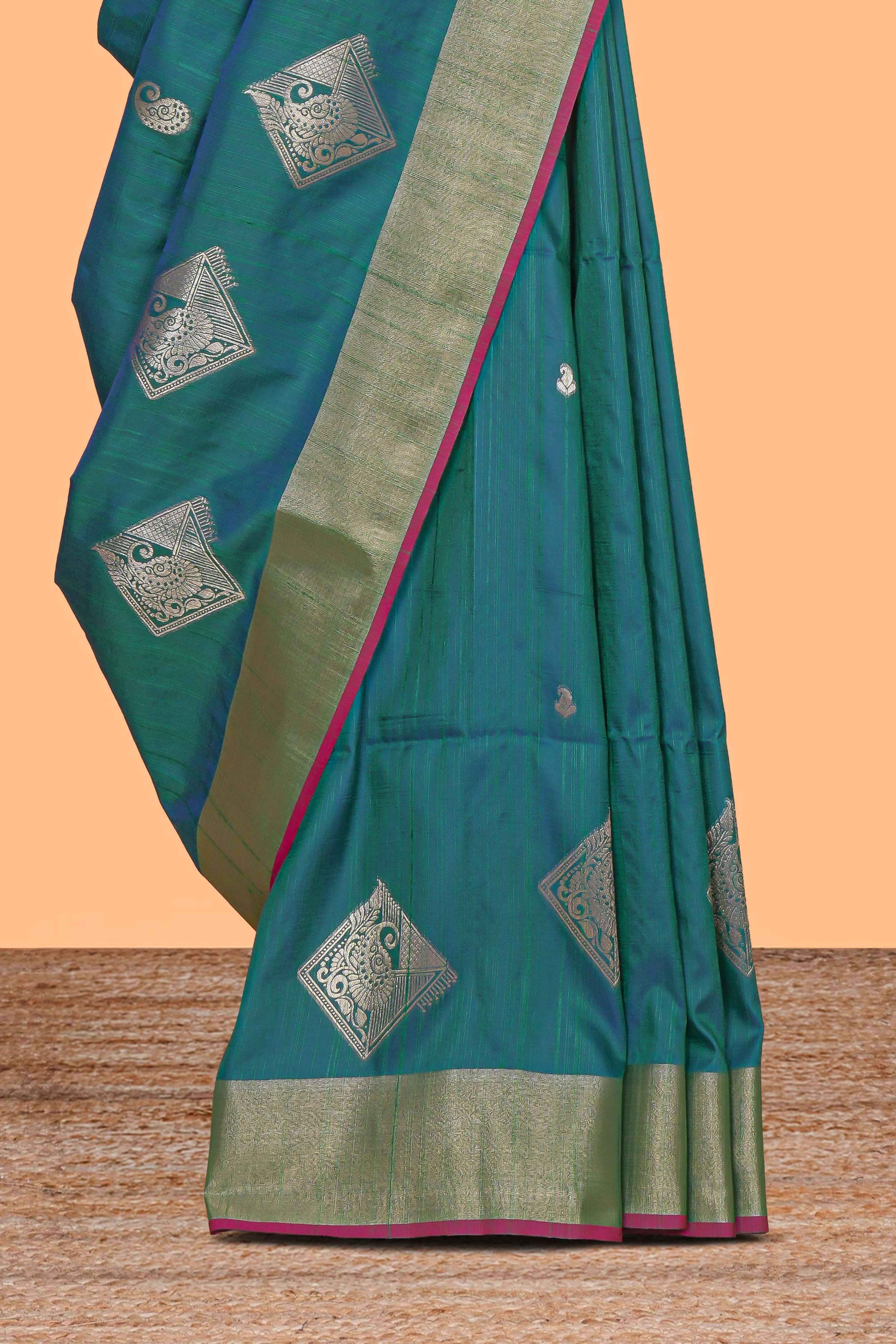 Green geometric motifs zari design kathan silk saree with contrast zari borders and motifs blouse