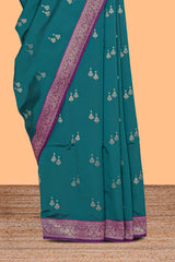 Green zari motifs design kathan silk saree with contrast zari borders and blouse