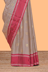 Beige zari motifs design kathan silk saree with self zari borders and matching blouse