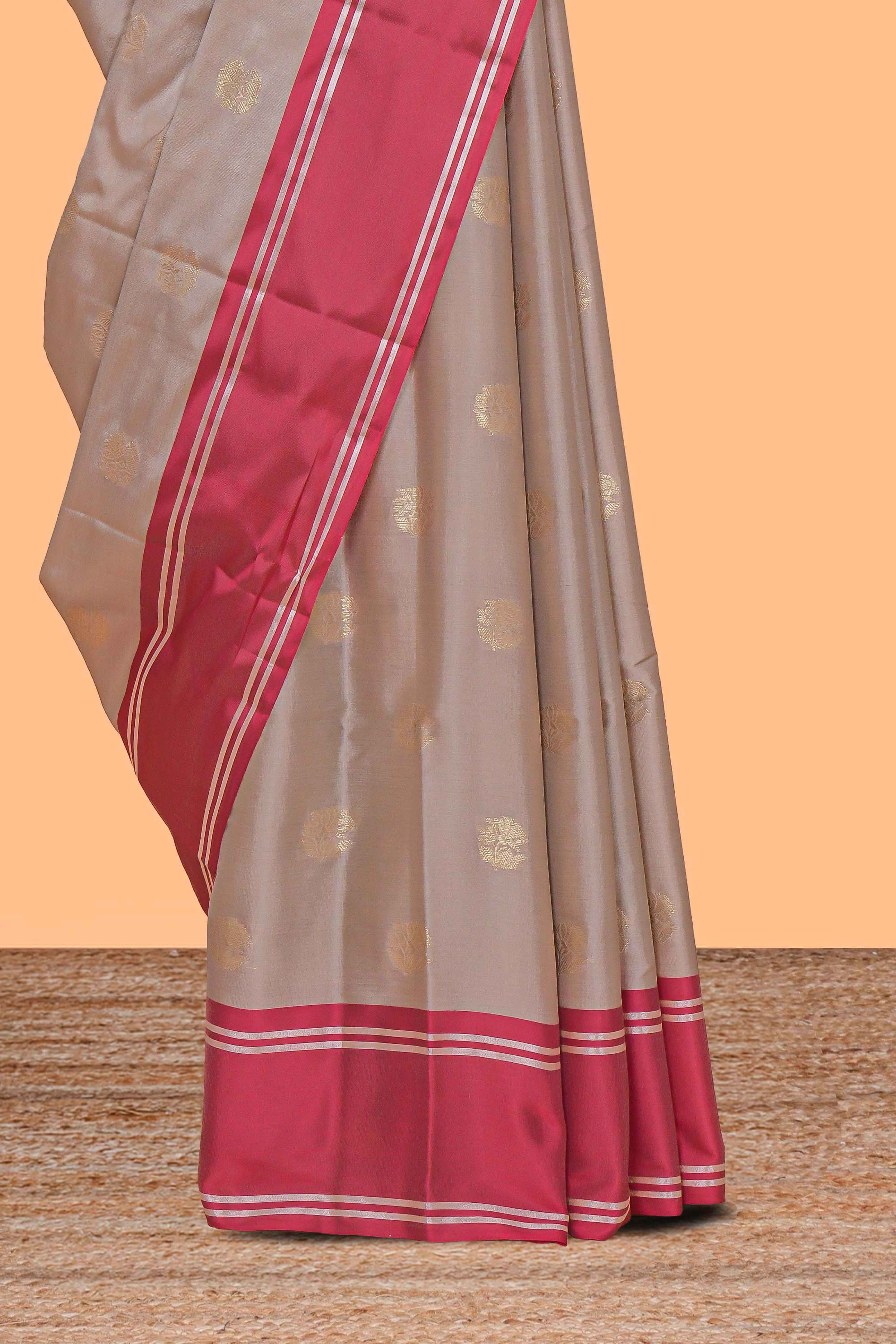 Beige zari motifs design kathan silk saree with self zari borders and matching blouse
