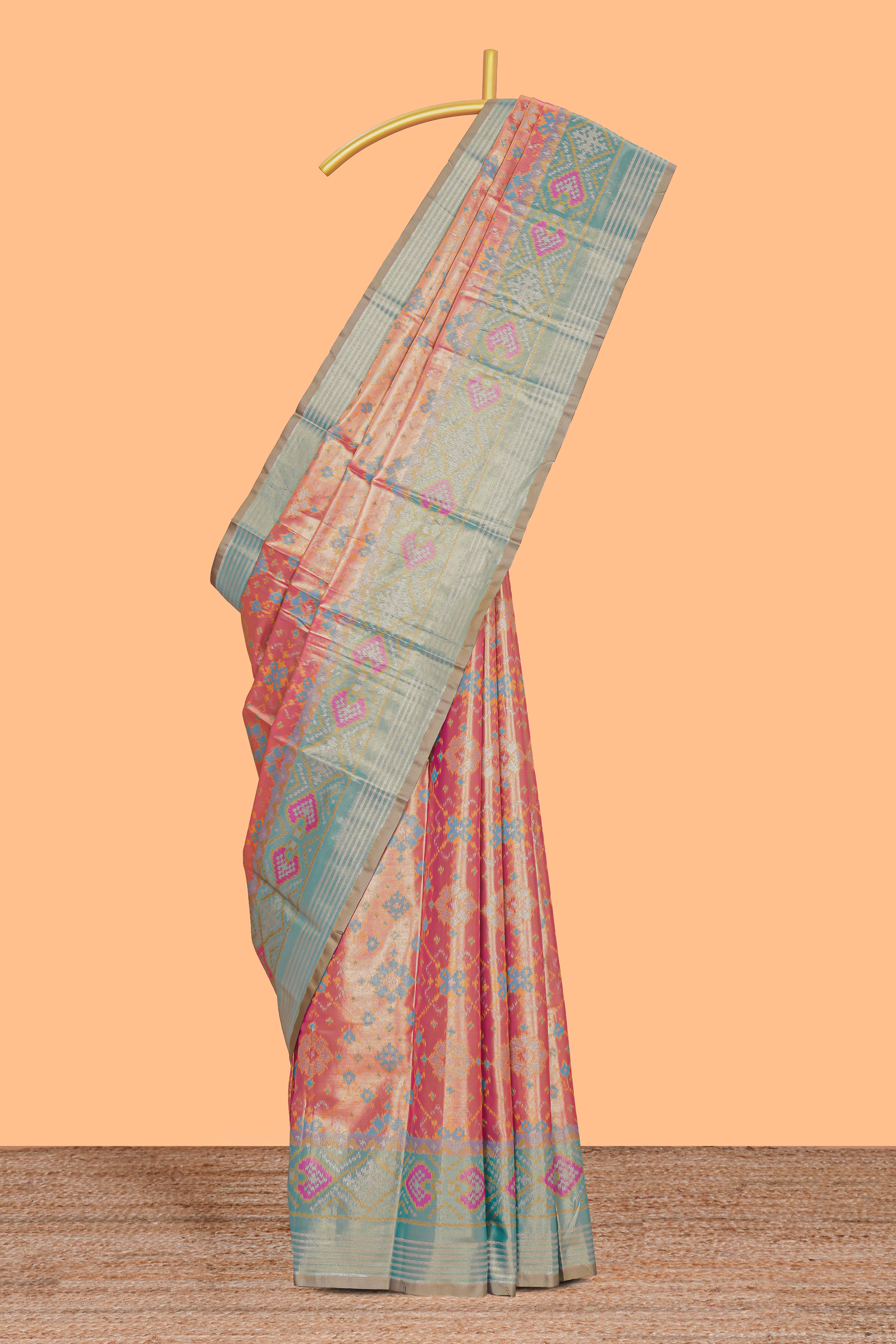 Peach ikkat design kathan silk saree with contrast borders and motifs blouse
