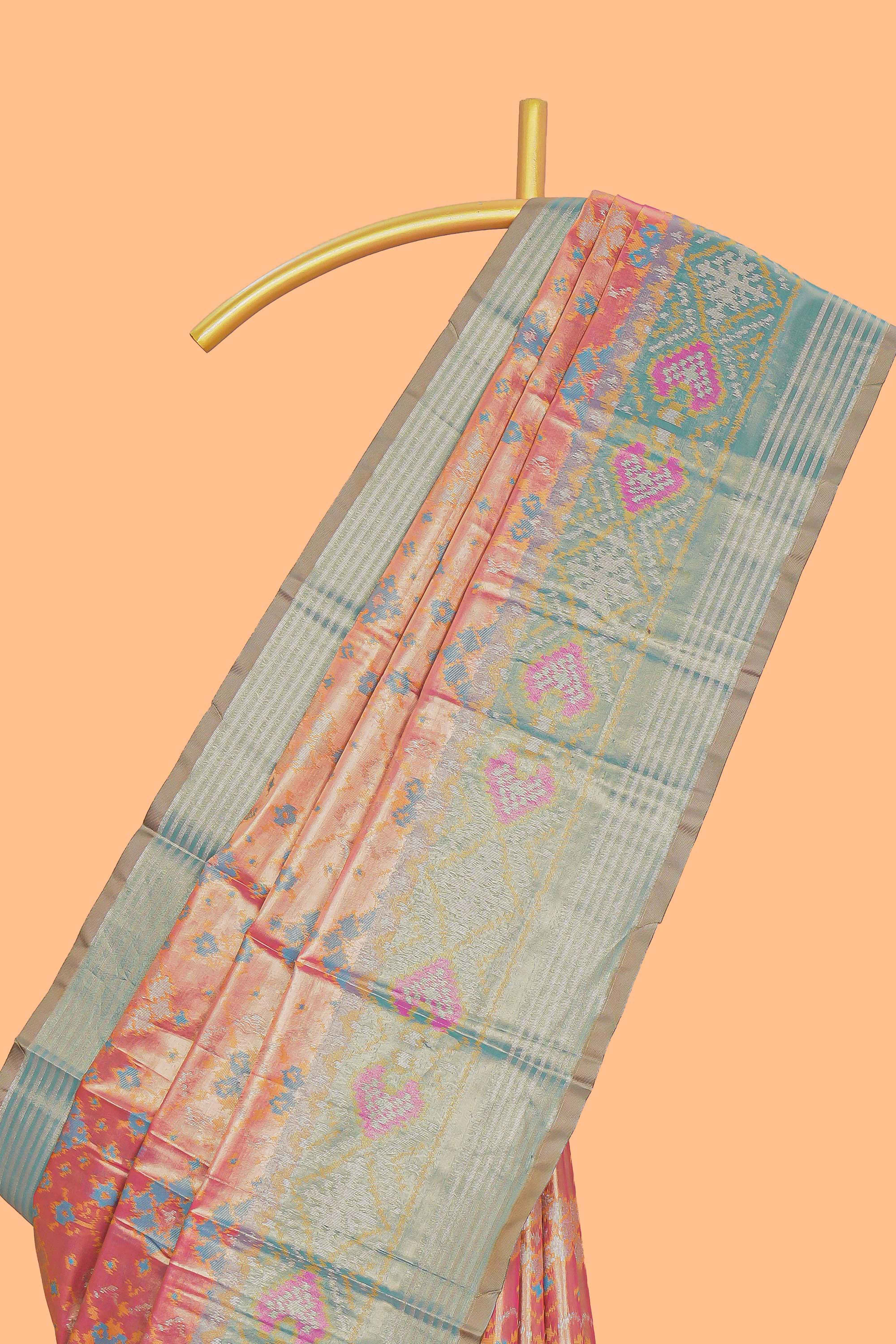 Peach ikkat design kathan silk saree with contrast borders and motifs blouse