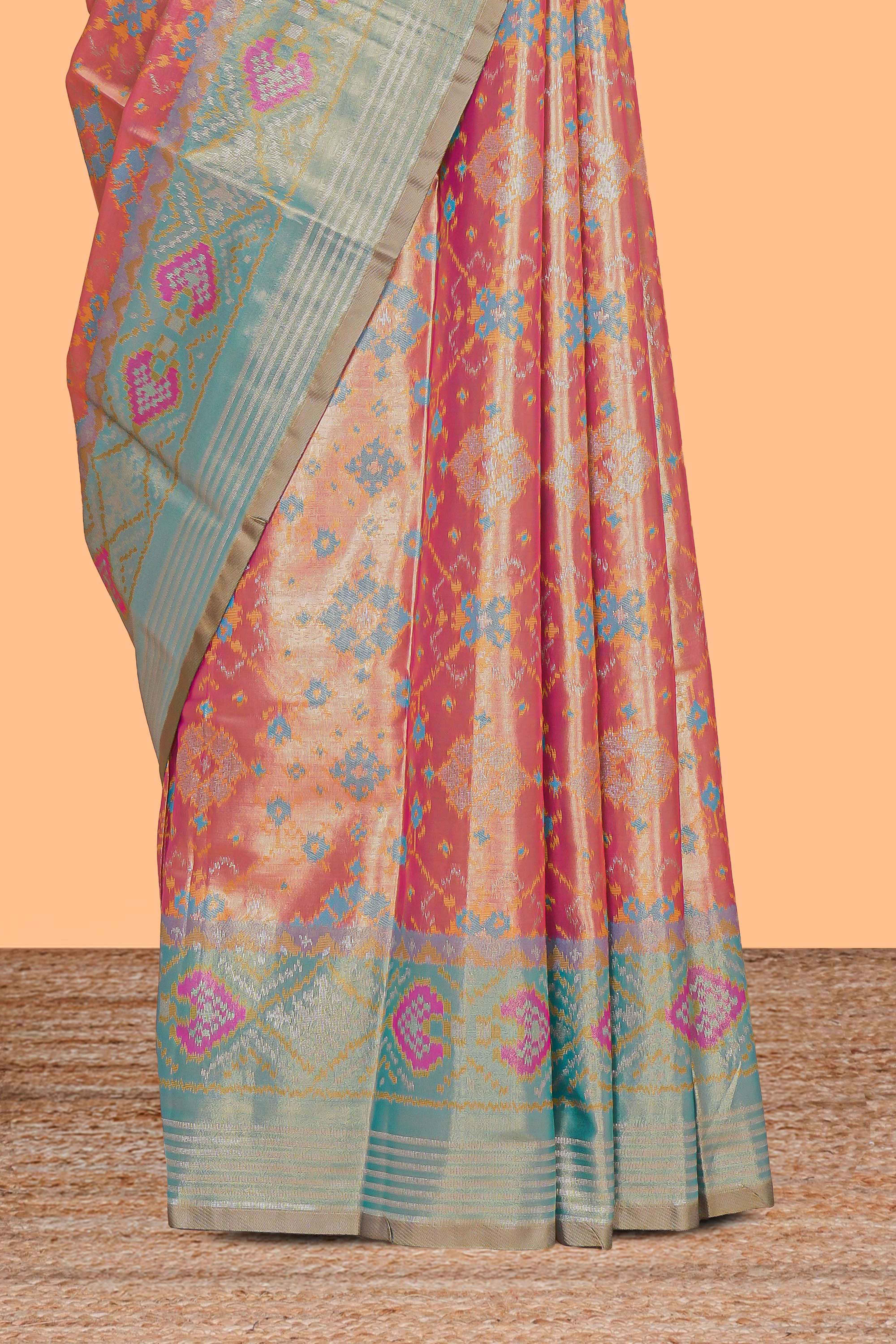 Peach ikkat design kathan silk saree with contrast borders and motifs blouse