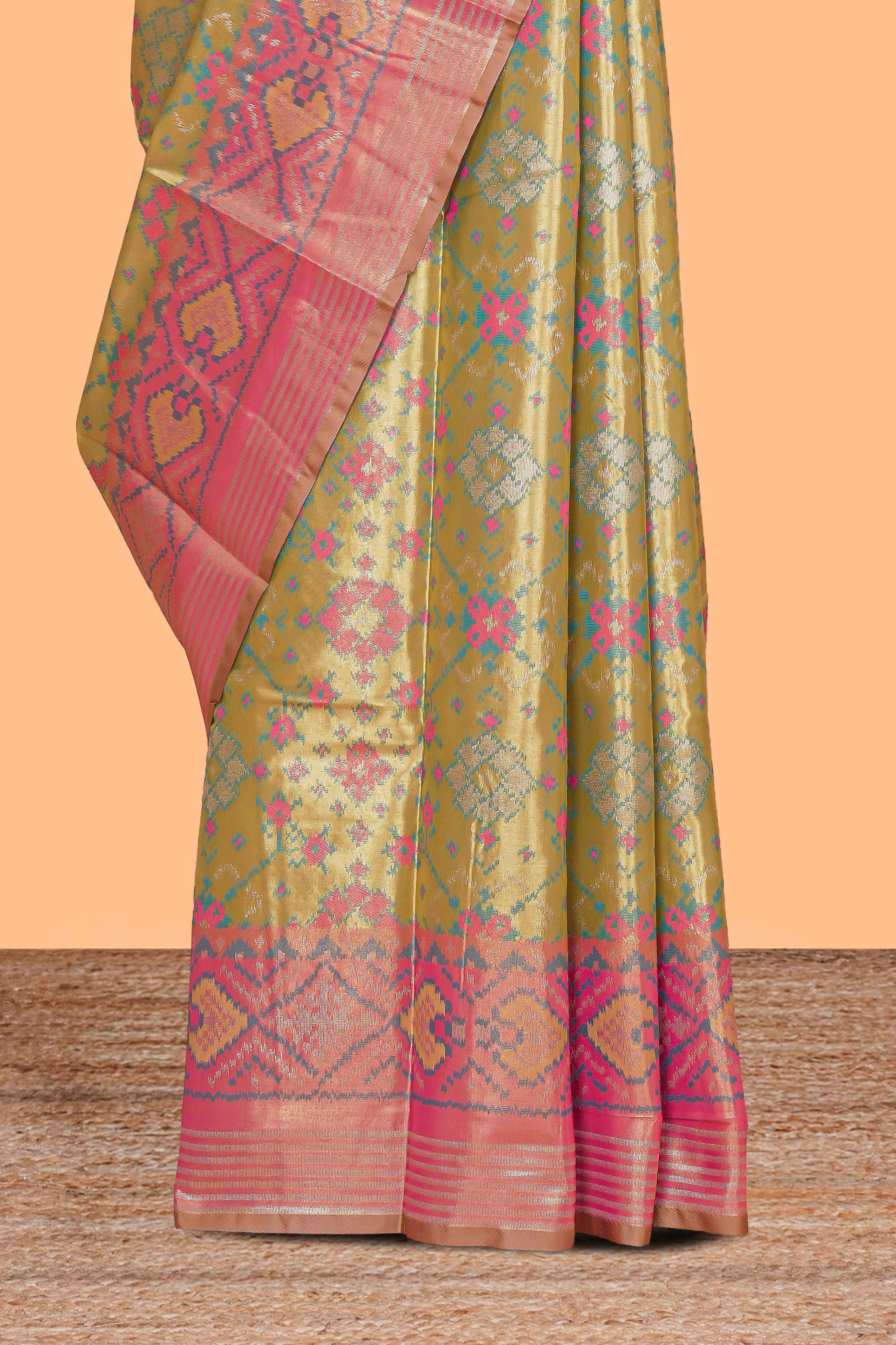 Green ikkat floral design kathan silk saree with contrast borders and motifs blouse
