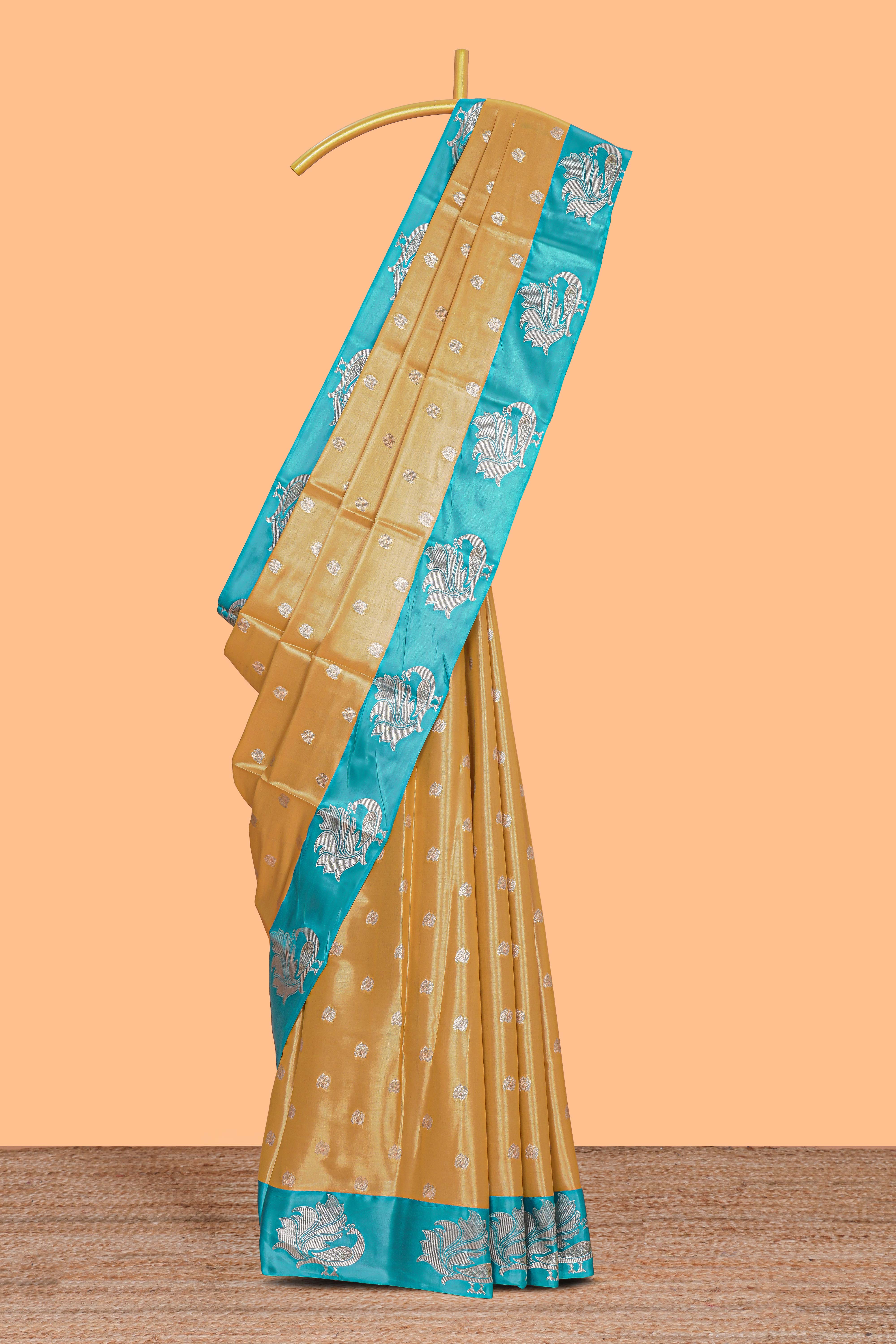 Mustard zari motifs design kathan silk saree with contrast borders and motifs blouse