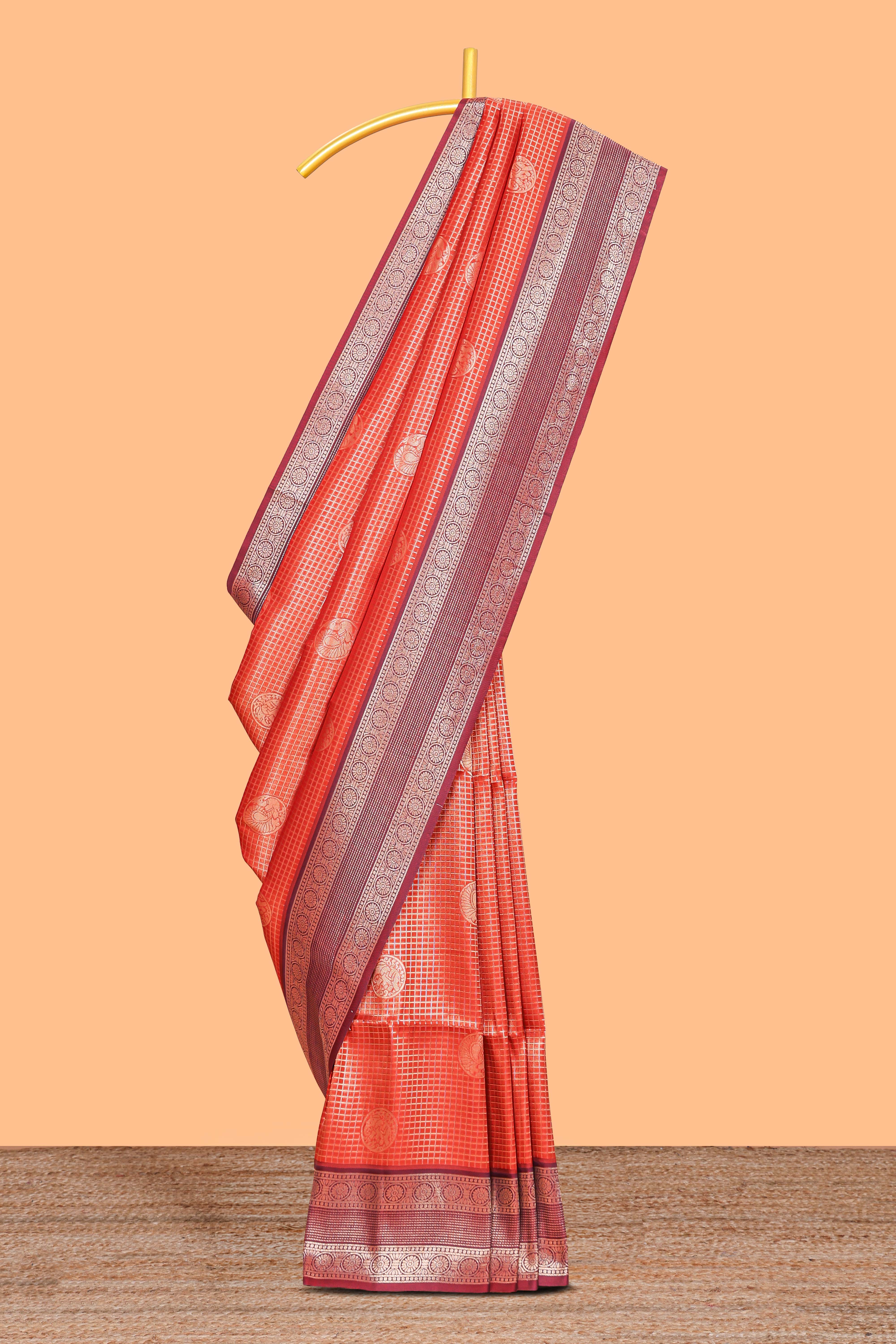 Orange checked motifs zari design kathan silk saree with contrast border and motifs blouse