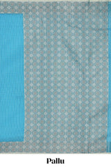 Blue checked kota cotton saree with contrast border and floral design blouse