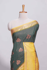 Deep bottle kotta cotton saree green with copper zari floral buttas a rich zari border and woven zari pallu with matching blouse piece
