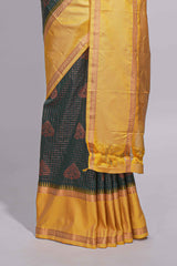 Deep bottle kotta cotton saree green with copper zari floral buttas a rich zari border and woven zari pallu with matching blouse piece