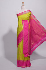 Green color kotta cotton saree with copper zari floral buttas a rich zari border and woven zari pallu with matching blouse piece