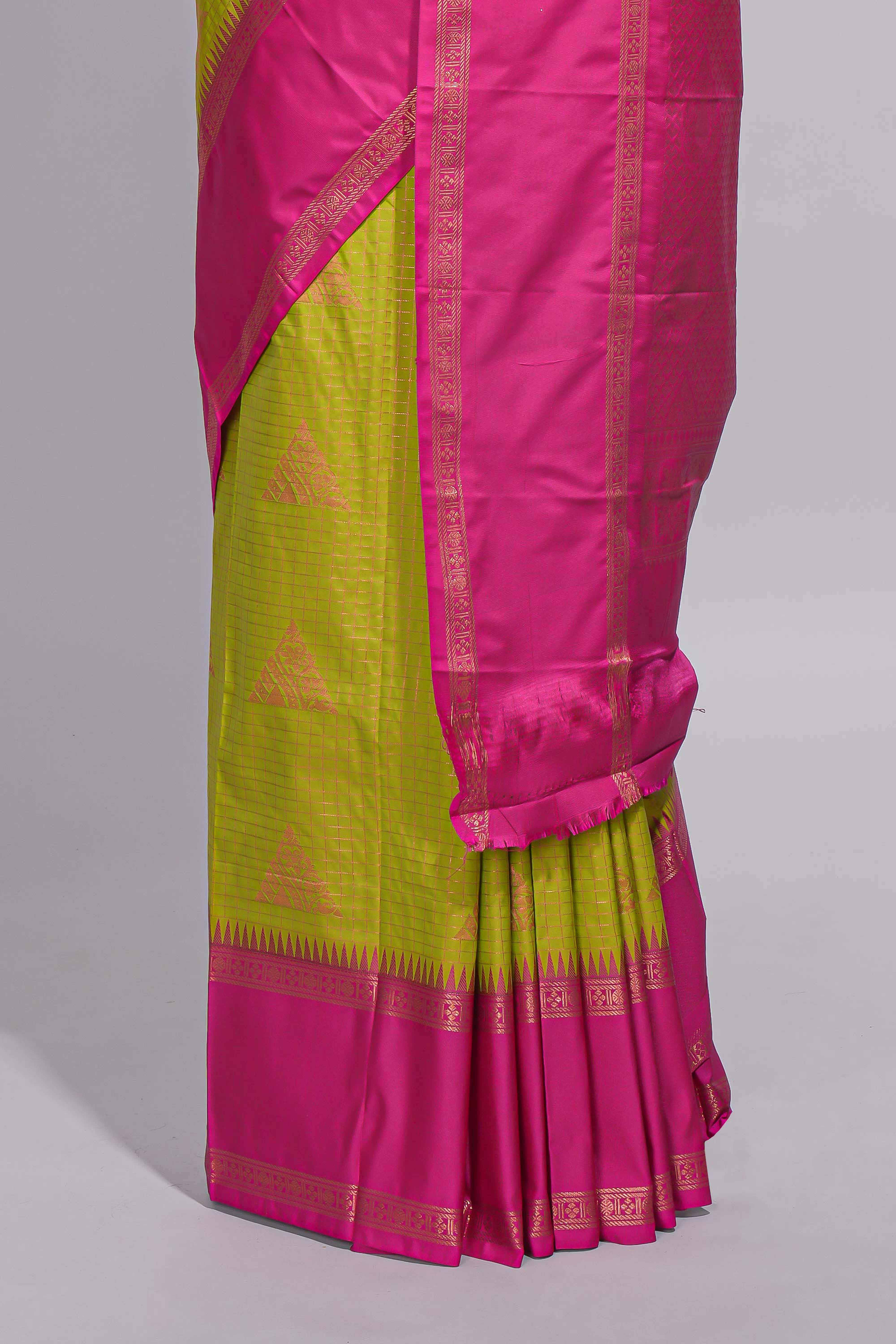 Green color kotta cotton saree with copper zari floral buttas a rich zari border and woven zari pallu with matching blouse piece
