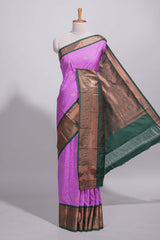 Purple colour kotta cotton saree with copper zari floral buttas a rich zari border and woven zari pallu with matching blouse piece