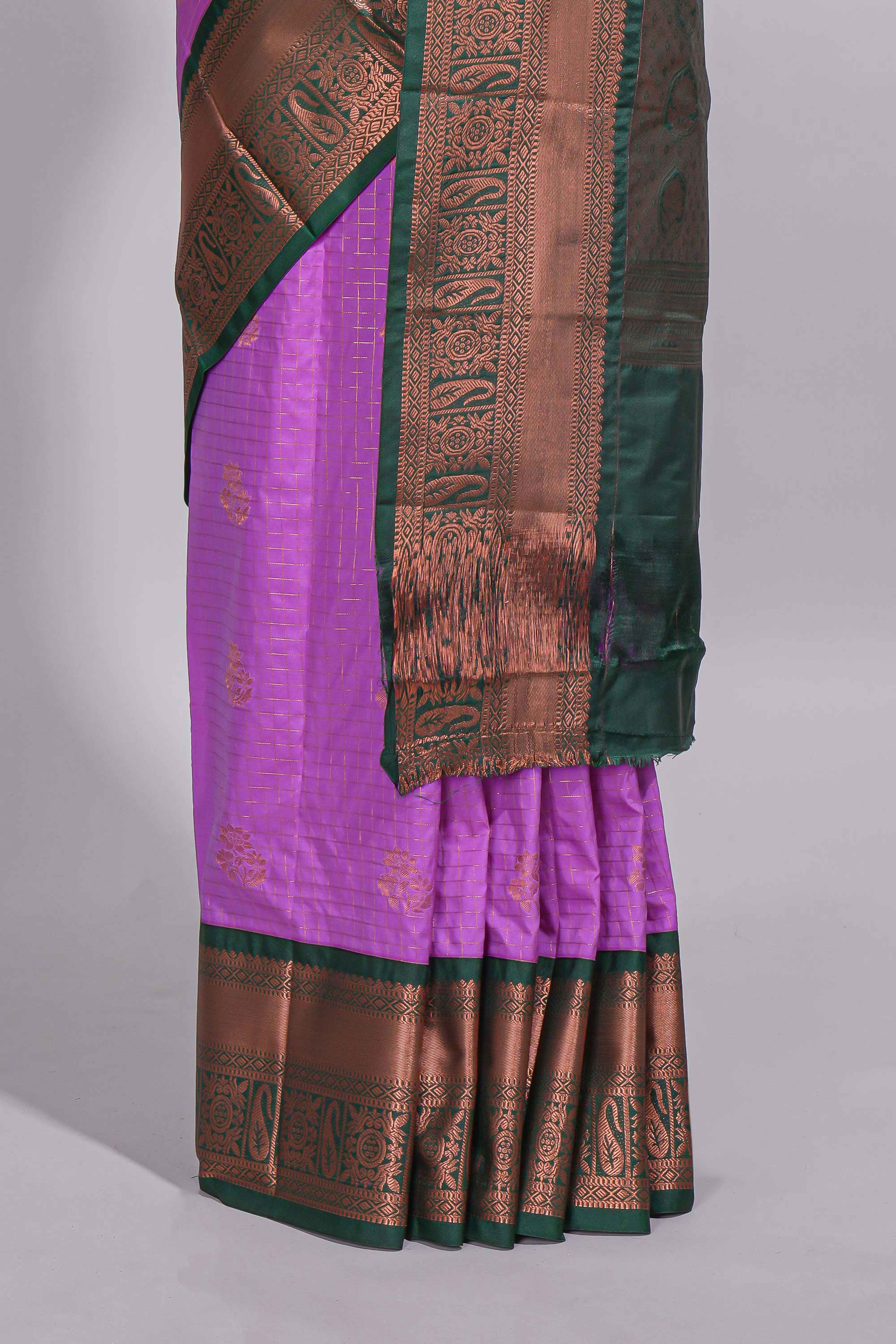 Purple colour kotta cotton saree with copper zari floral buttas a rich zari border and woven zari pallu with matching blouse piece