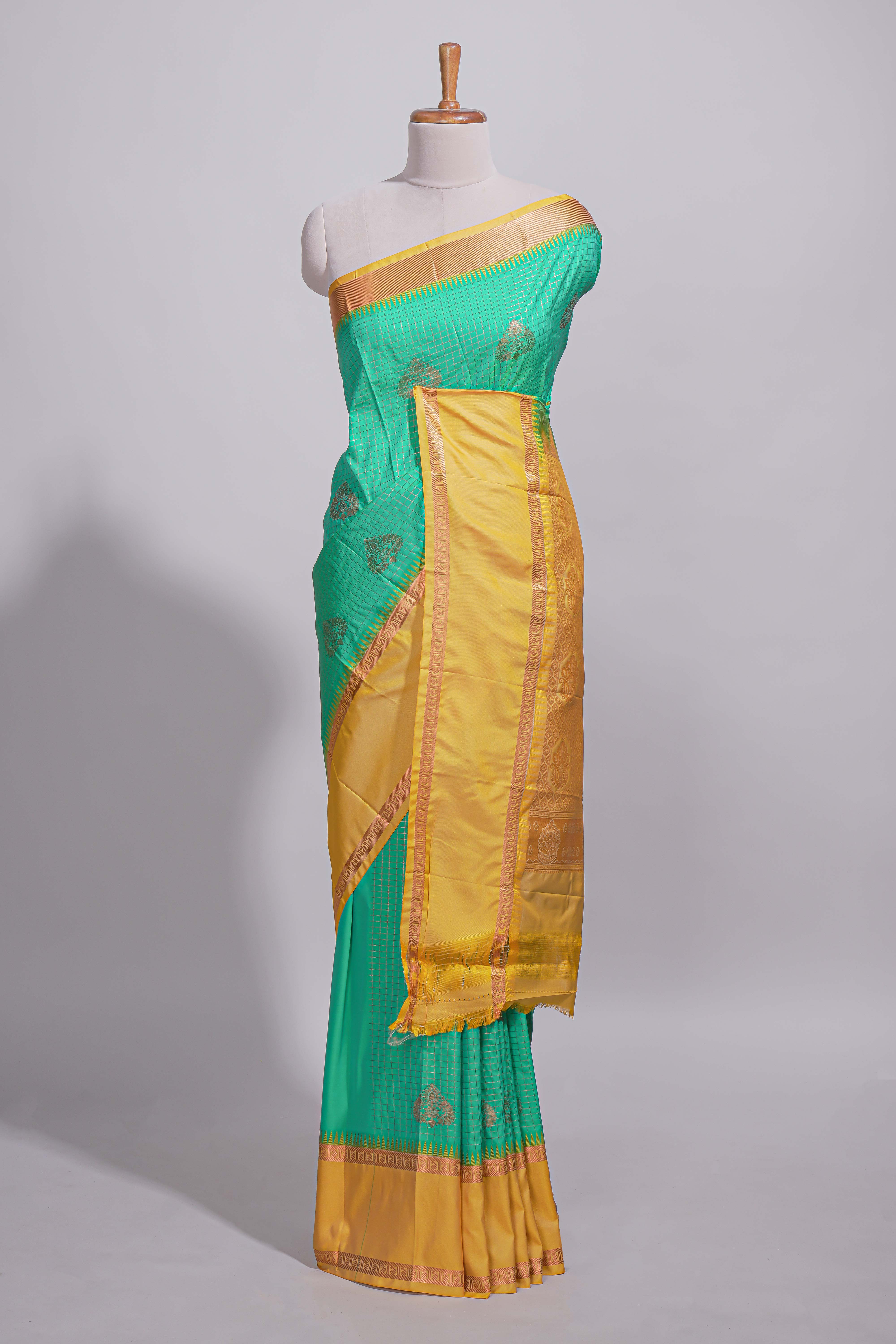 Rama green kotta cotton saree with zari floral buttas a rich zari border and woven zari pallu with matching blouse piece
