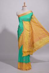 Rama green kotta cotton saree with zari floral buttas a rich zari border and woven zari pallu with matching blouse piece