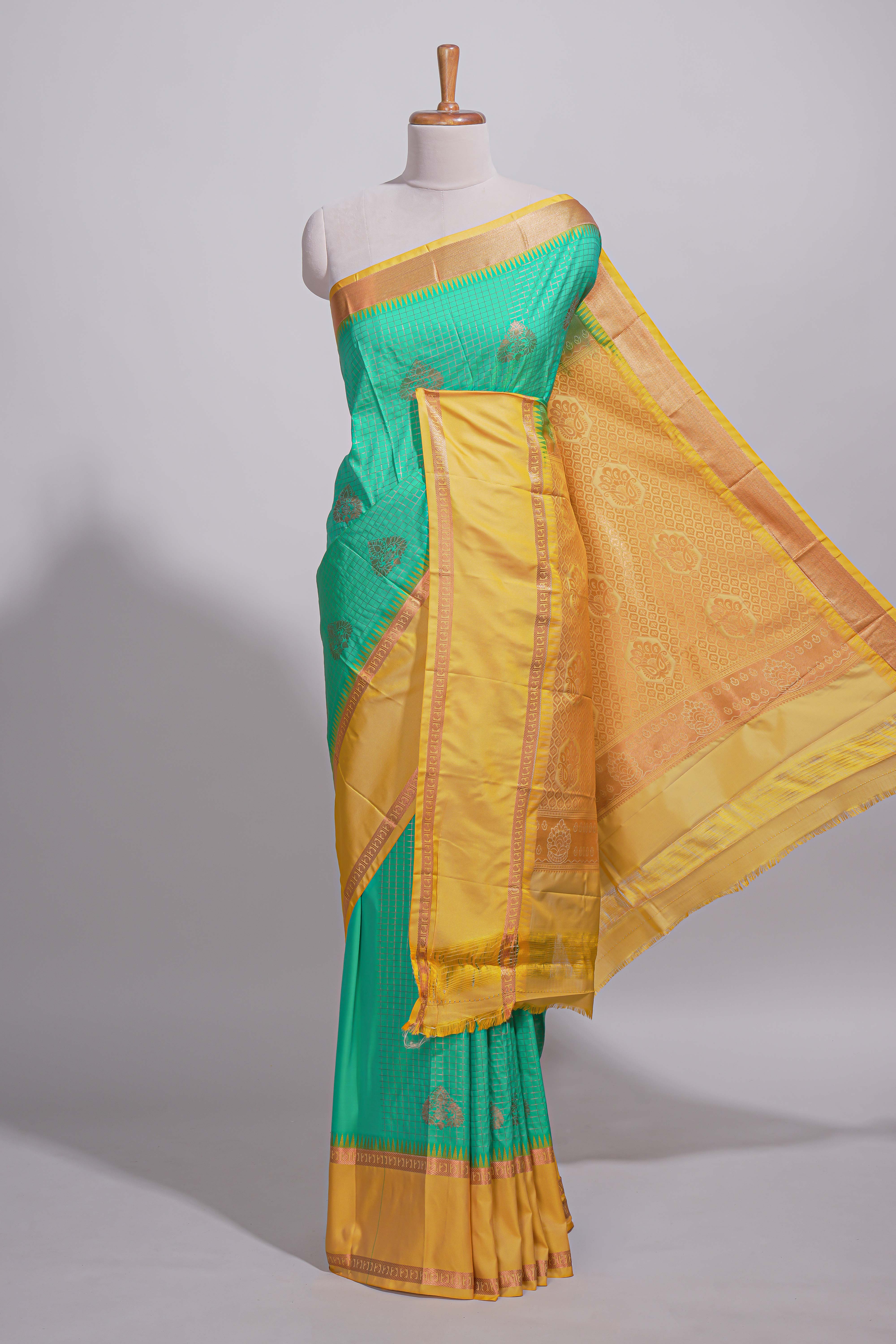 Rama green kotta cotton saree with zari floral buttas a rich zari border and woven zari pallu with matching blouse piece
