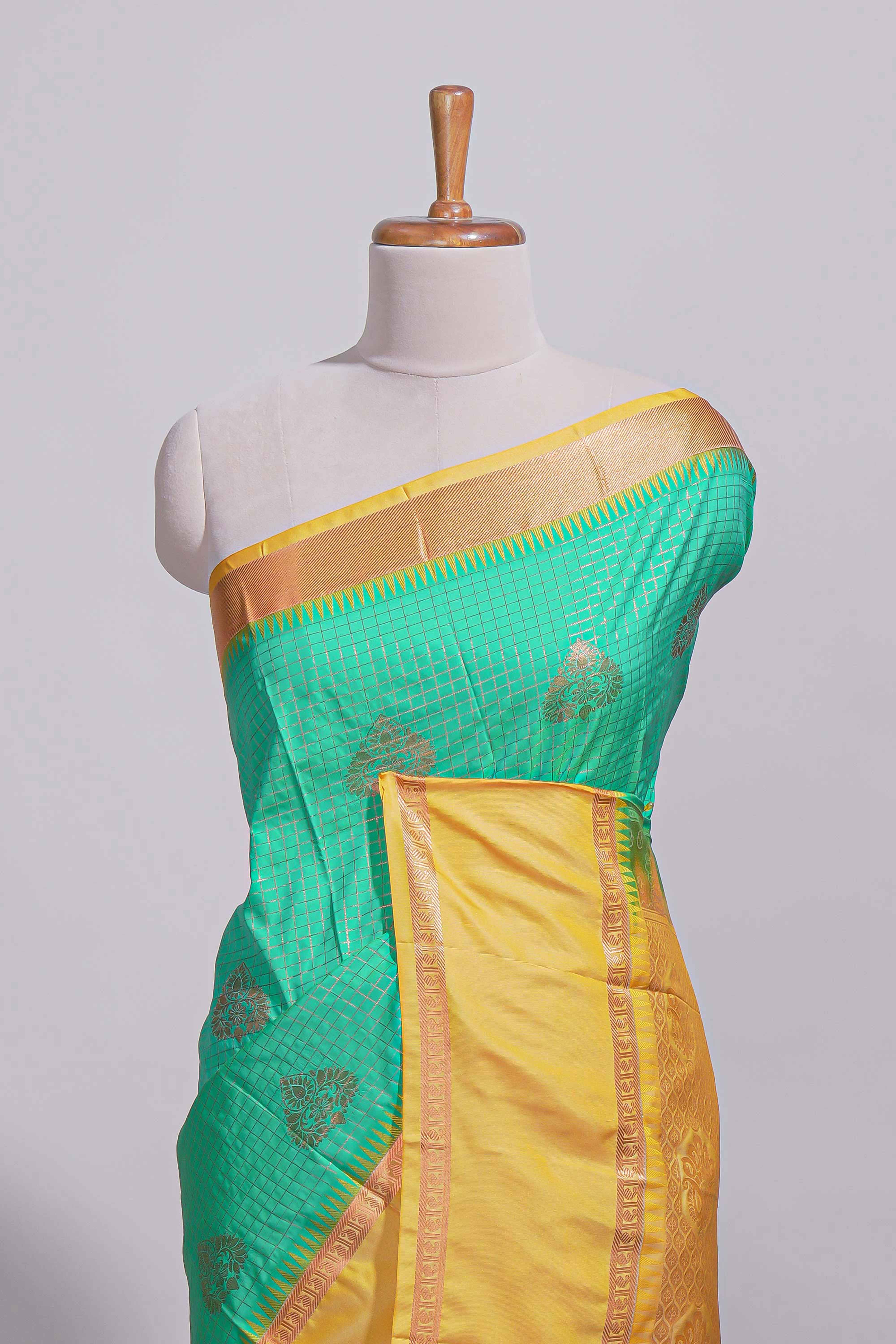 Rama green kotta cotton saree with zari floral buttas a rich zari border and woven zari pallu with matching blouse piece