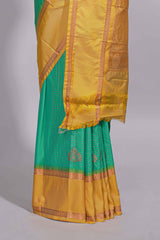 Rama green kotta cotton saree with zari floral buttas a rich zari border and woven zari pallu with matching blouse piece