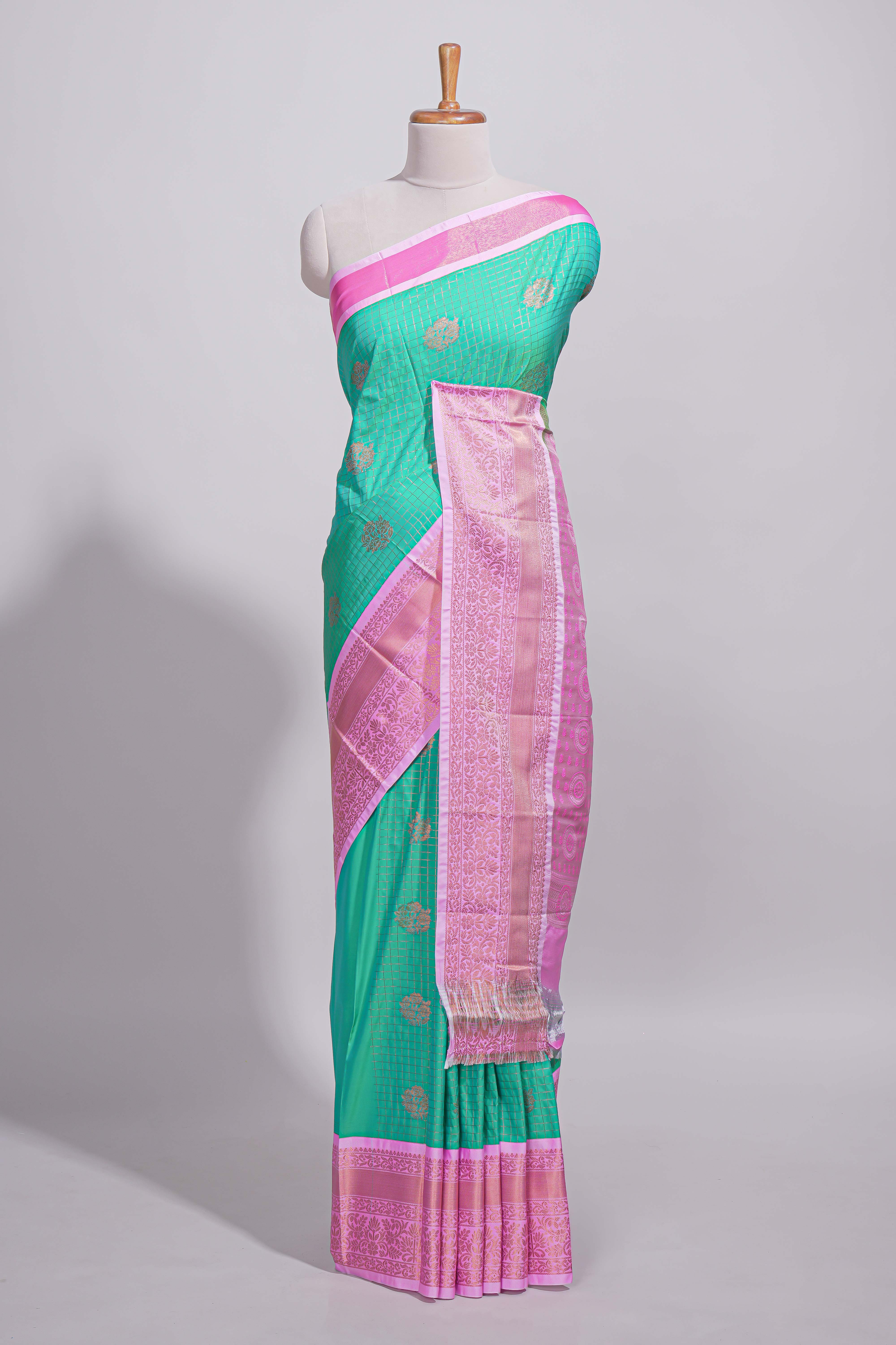 Aqua green kotta cotton saree with zari floral buttas a rich zari border and woven zari pallu with matching blouse piece
