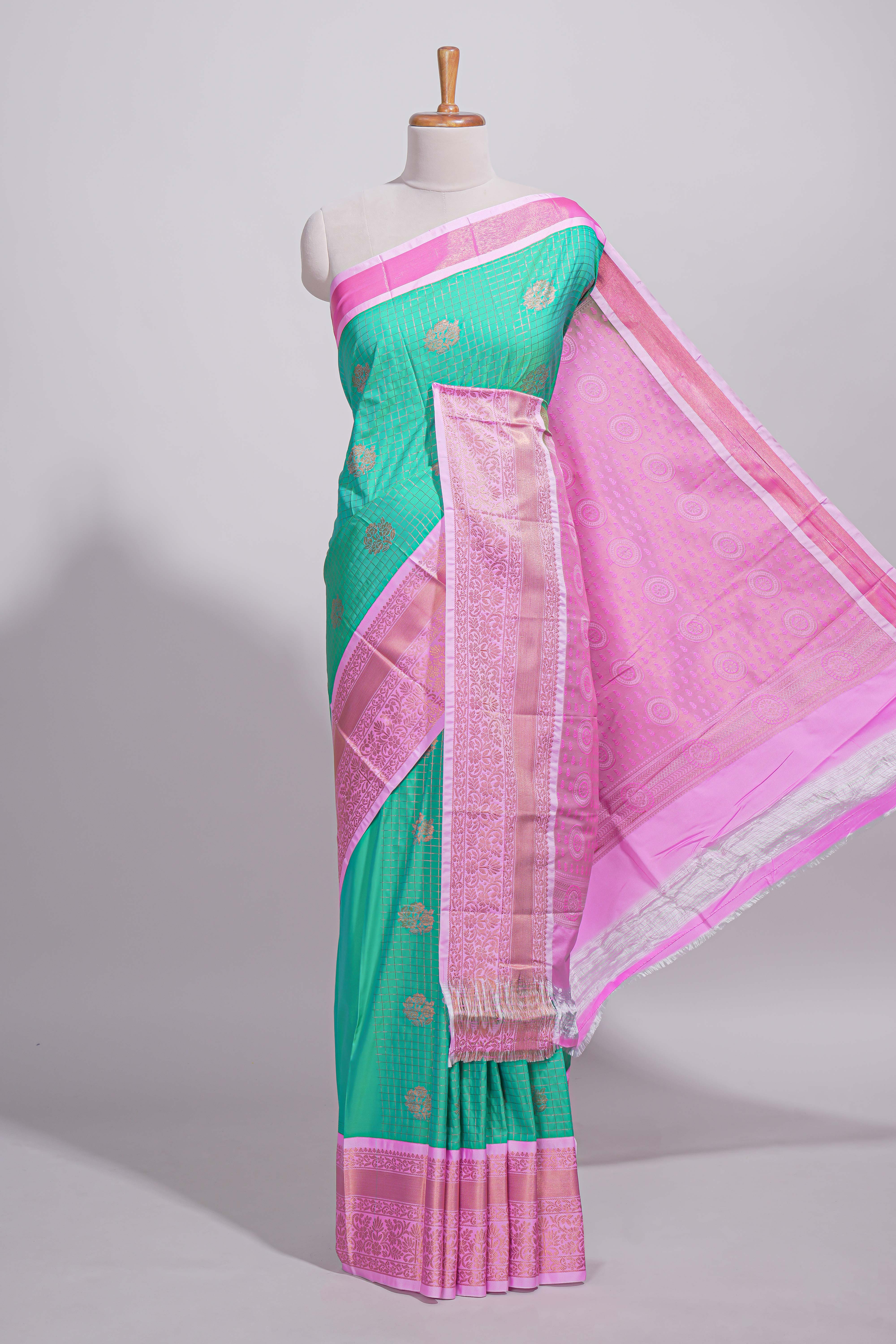 Aqua green kotta cotton saree with zari floral buttas a rich zari border and woven zari pallu with matching blouse piece