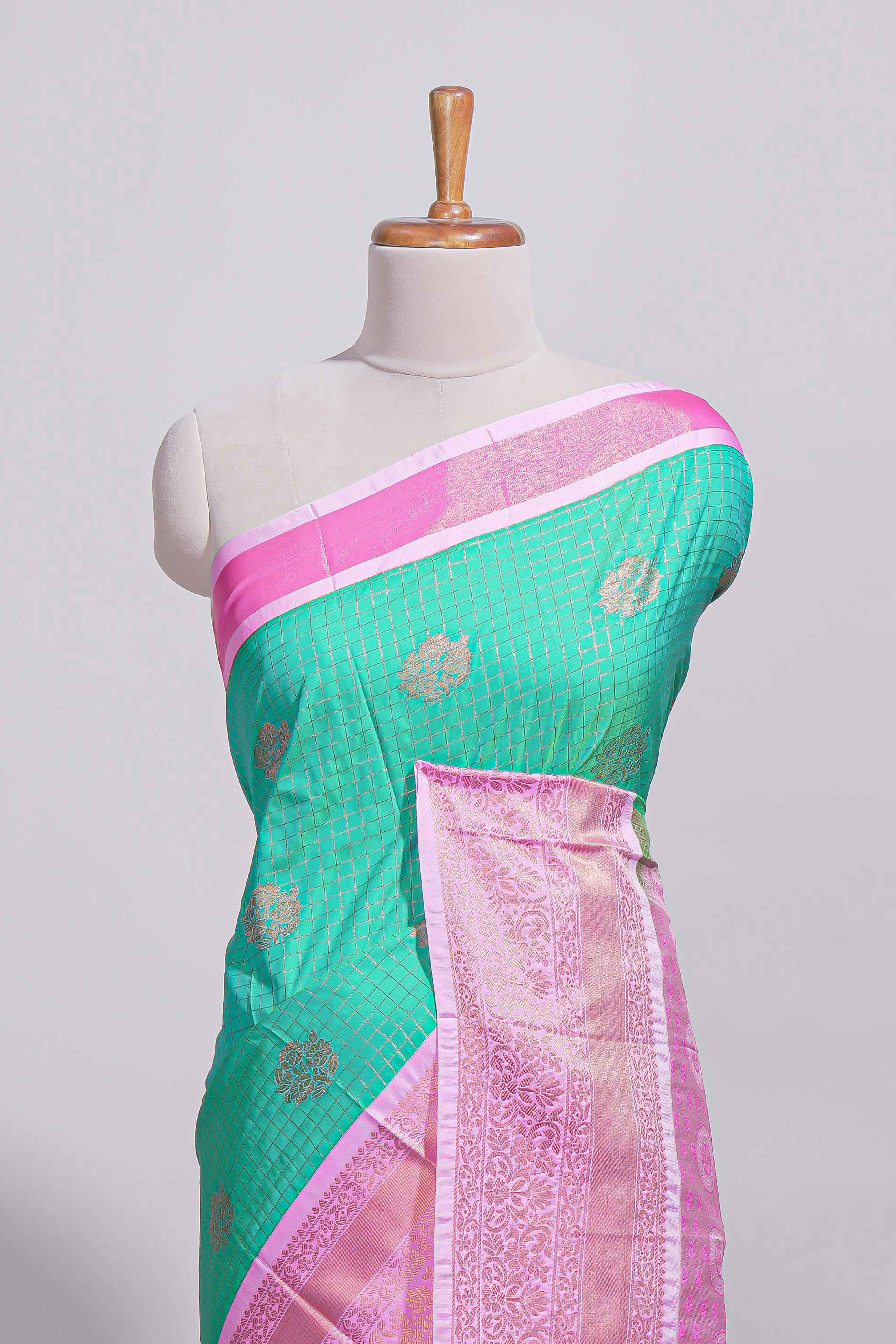 Aqua green kotta cotton saree with zari floral buttas a rich zari border and woven zari pallu with matching blouse piece