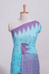 Sky blue Kotta cotton saree with woven buttas contrasting purple Ikat-inspired border and a geometric woven pallu with matching blouse