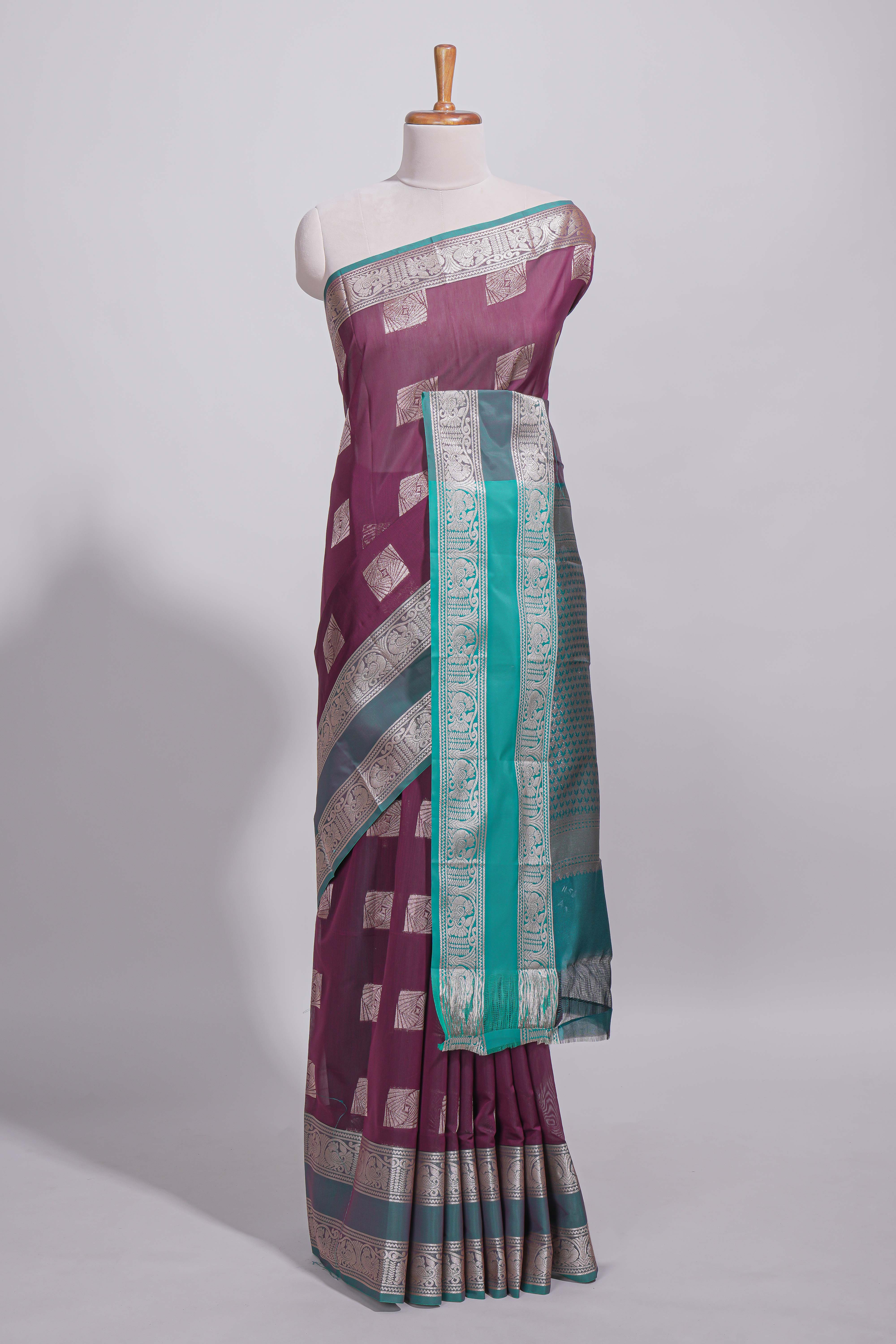Violet color tussar saree with silver zari square buttas retta petta zari border and woven zari pallu with contrast blouse piece