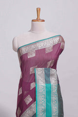 Violet color tussar saree with silver zari square buttas retta petta zari border and woven zari pallu with contrast blouse piece