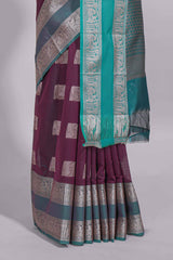 Violet color tussar saree with silver zari square buttas retta petta zari border and woven zari pallu with contrast blouse piece