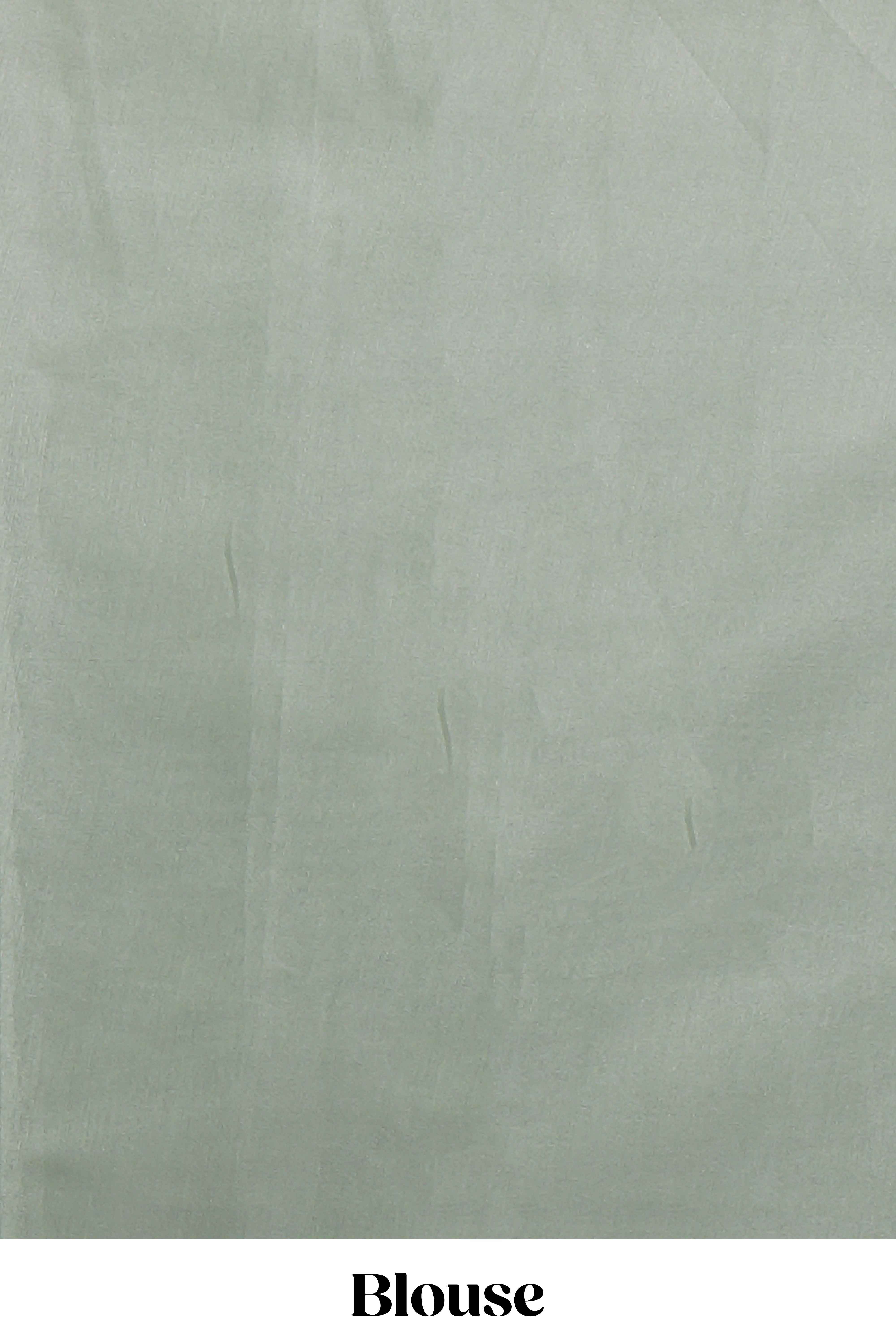 Pastel green Kotta saree with gold woven checks and buttawith rich gold zari woven pallu with matching blouse
