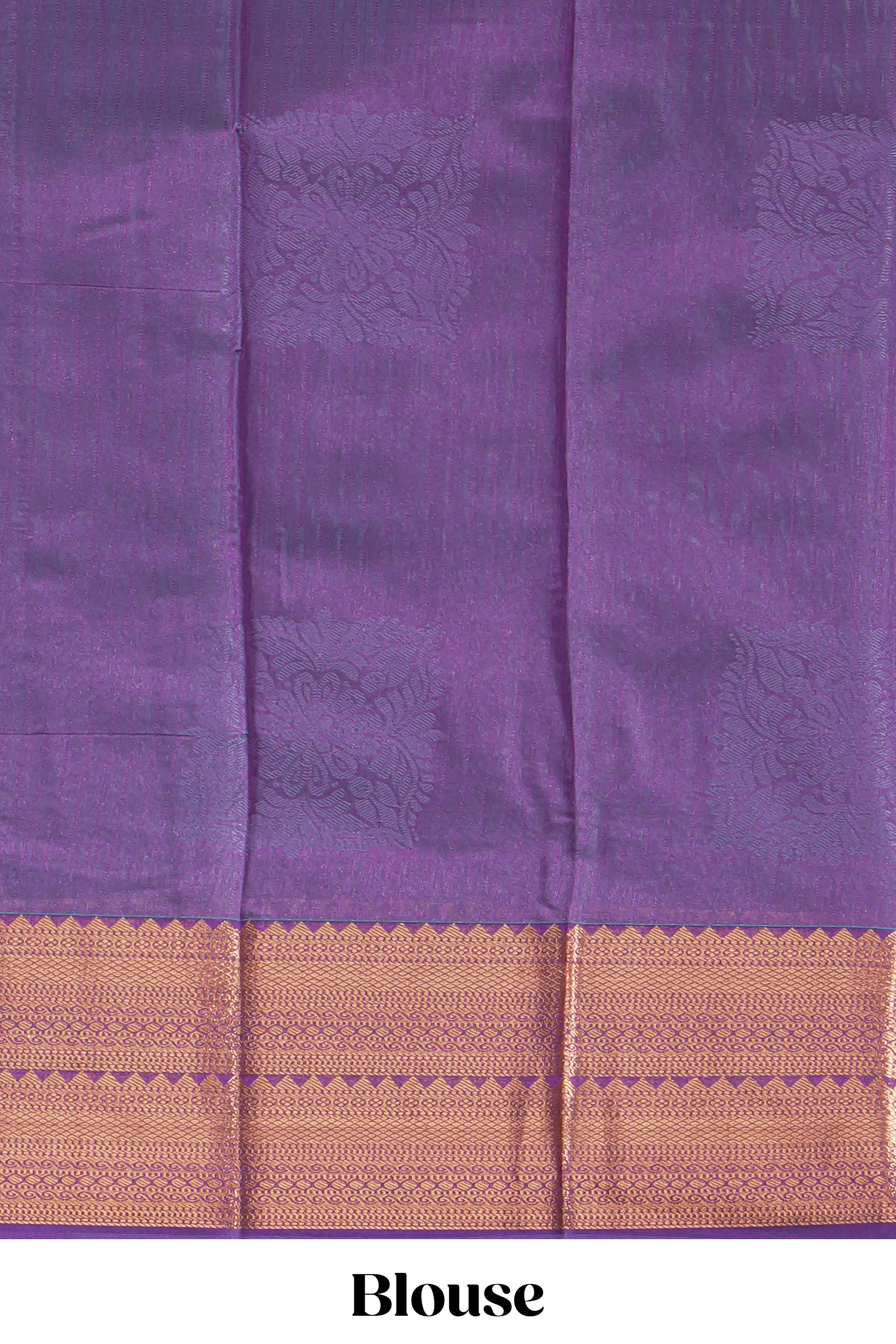 Blue tussar saree with gold zari floral buttas teal zari border and woven zari pallu with contrast blouse piece