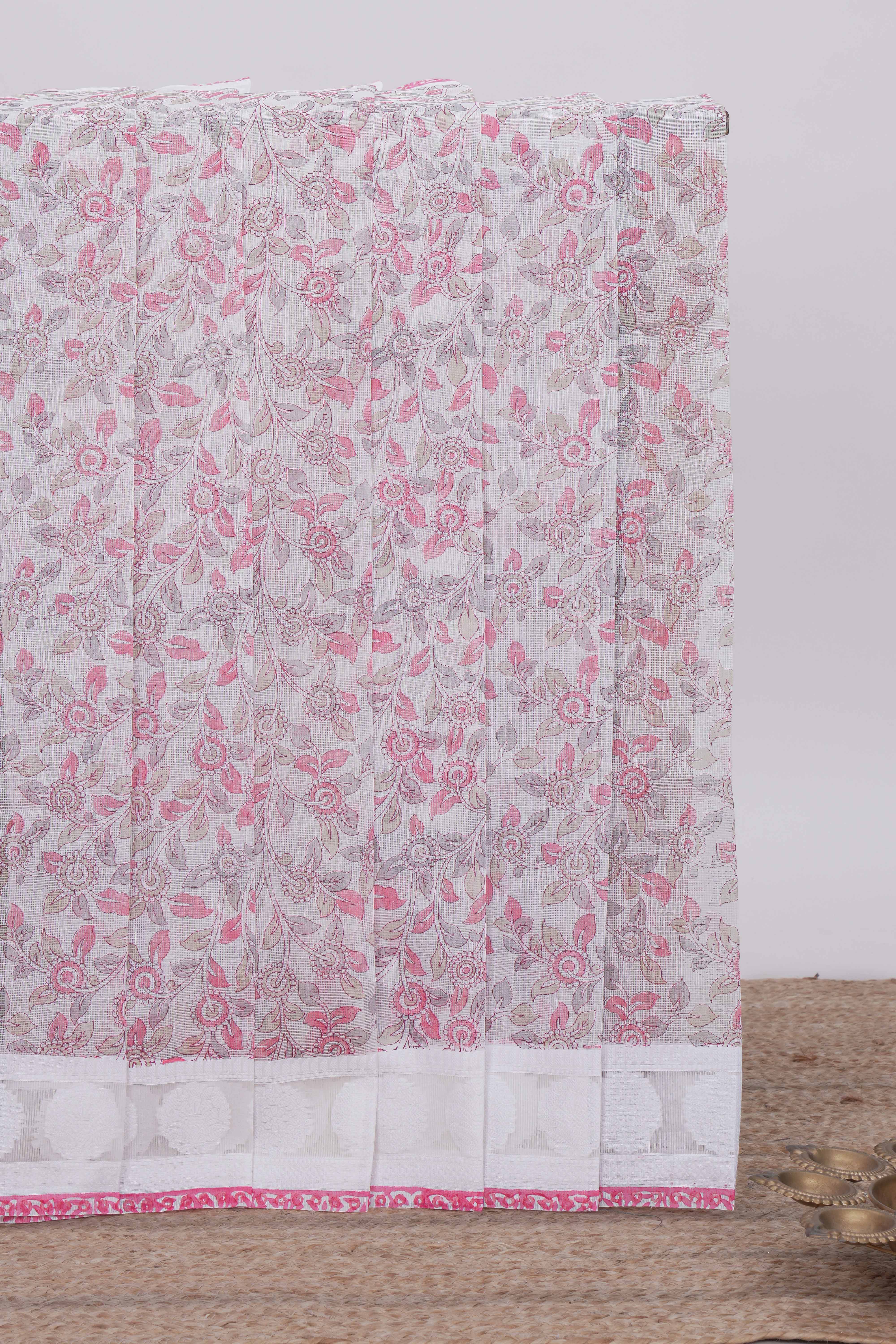 Off white floral design kota cotton saree with self border and matching motifs blouse
