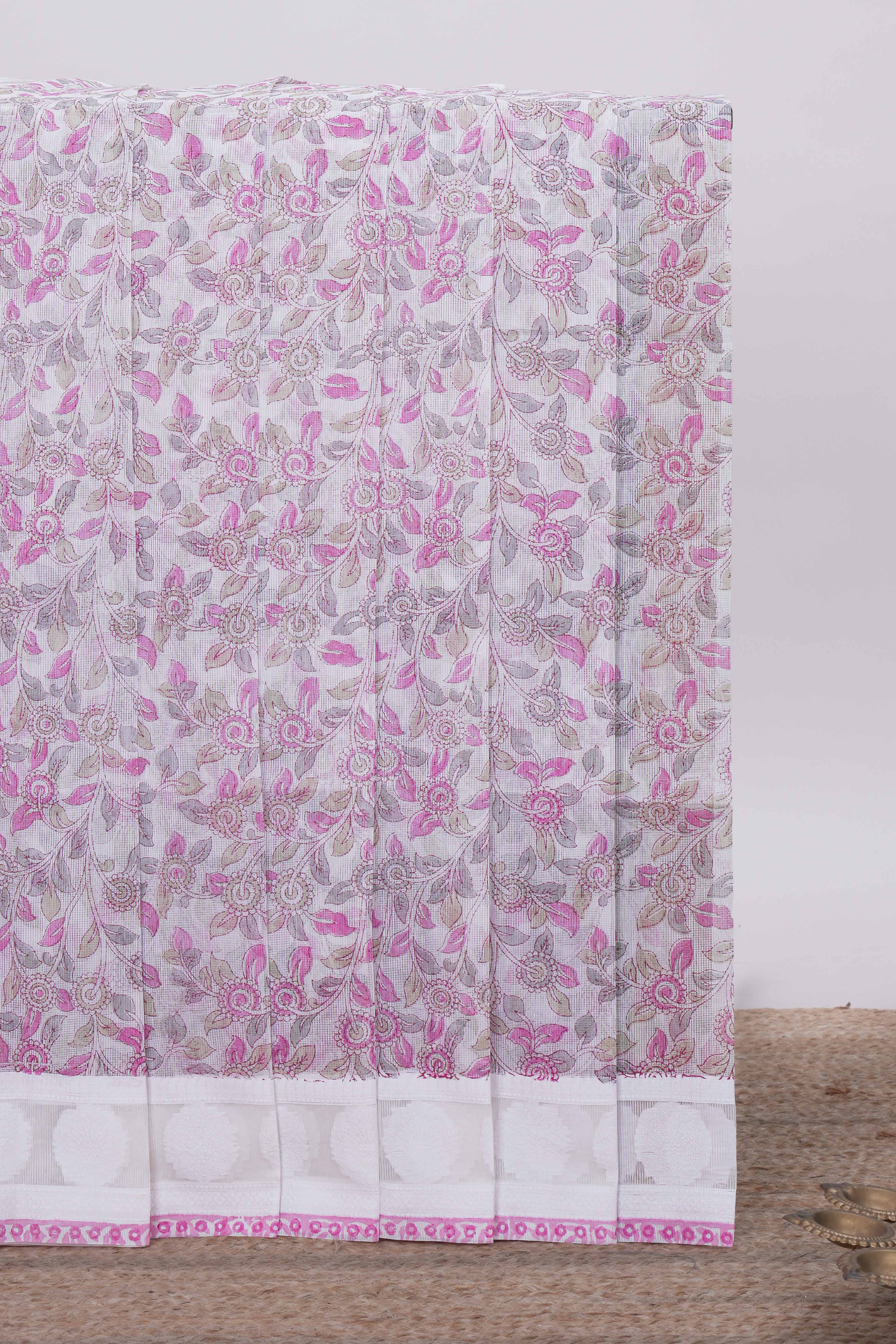 Off white floral design kota cotton saree with self border and matching motifs blouse