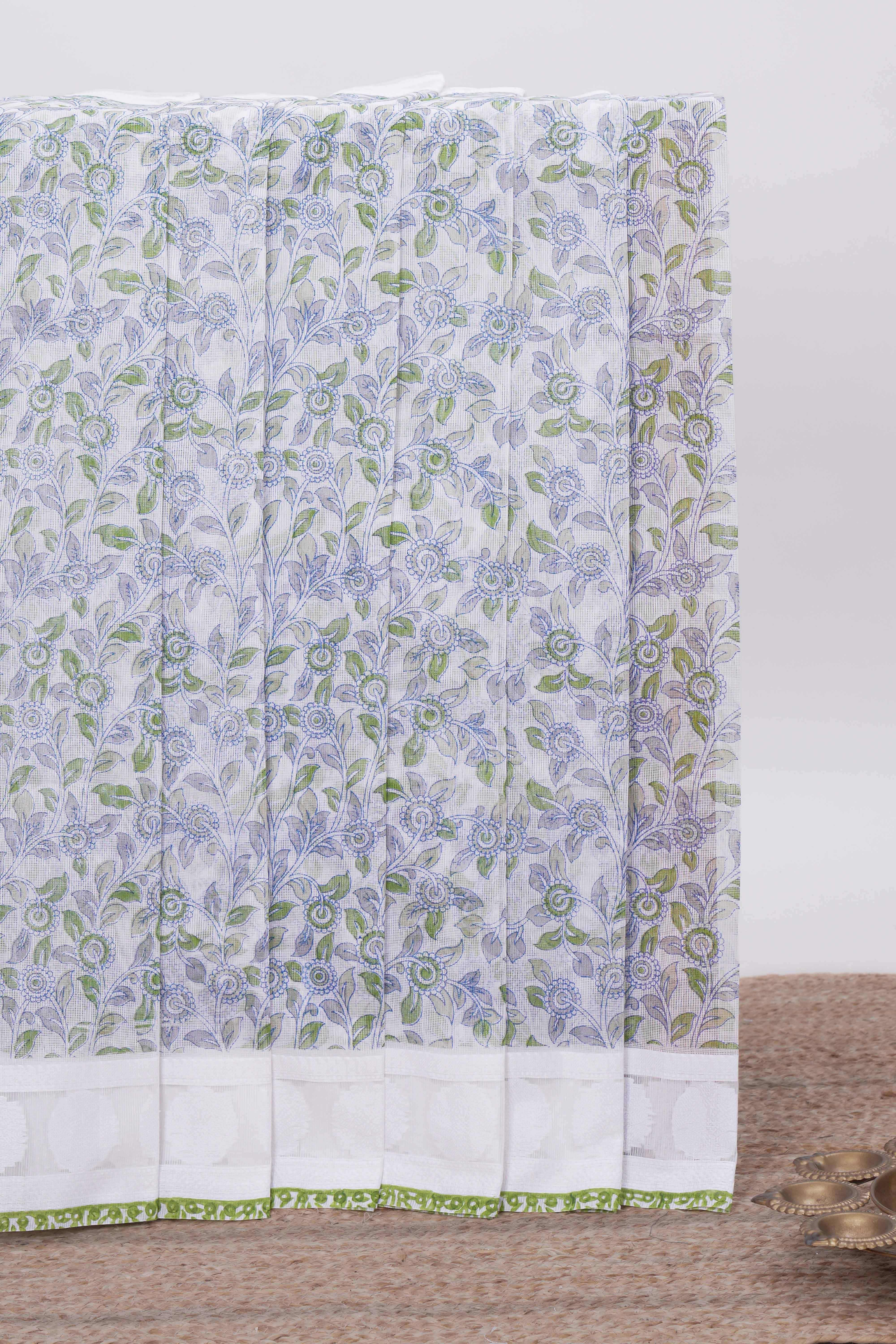 Off white floral design kota cotton saree with self border and matching motifs blouse