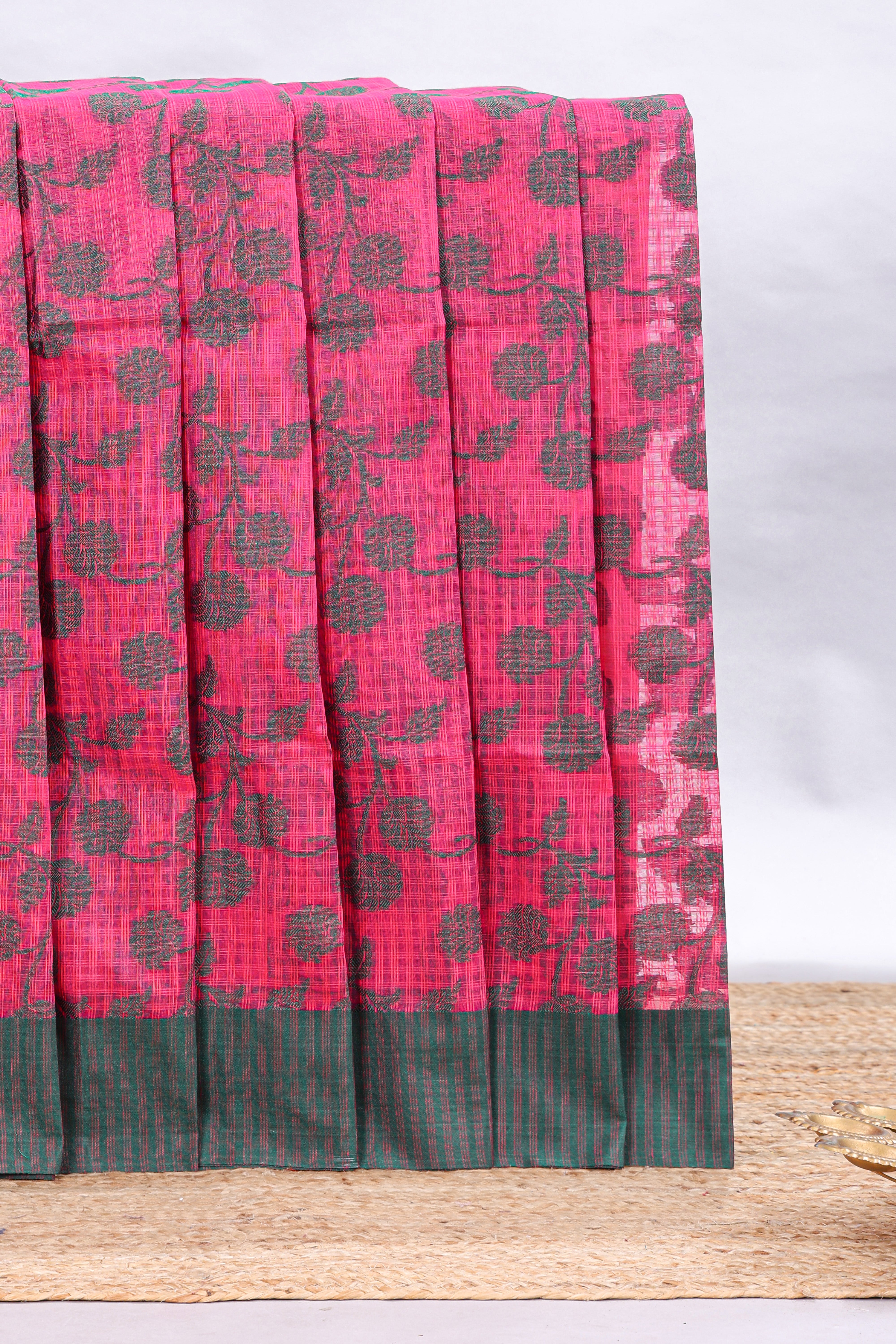Pink checked floral design kota cotton saree with contrast border and striped blouse