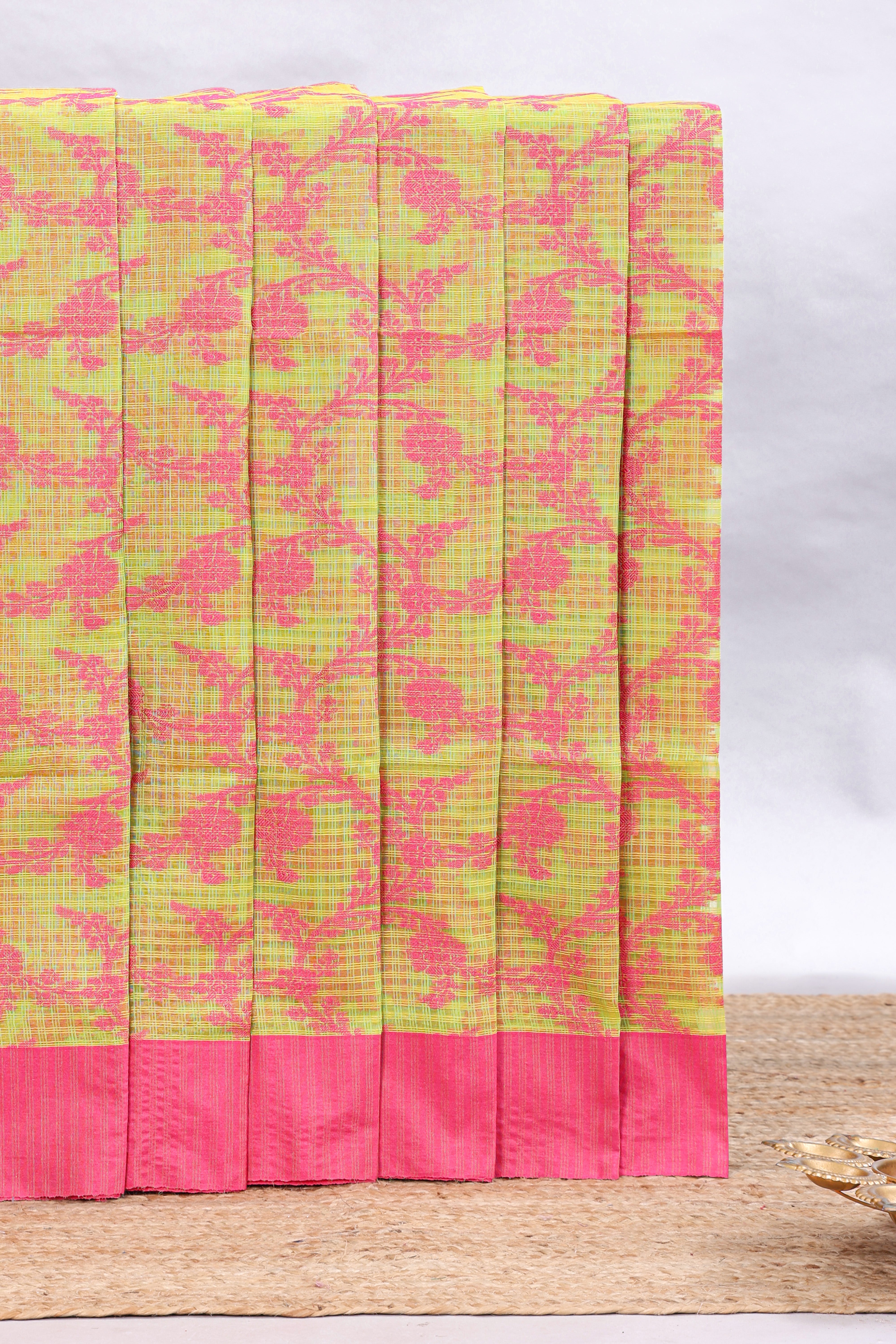 Green checked floral design kota cotton saree with contrast border and striped blouse