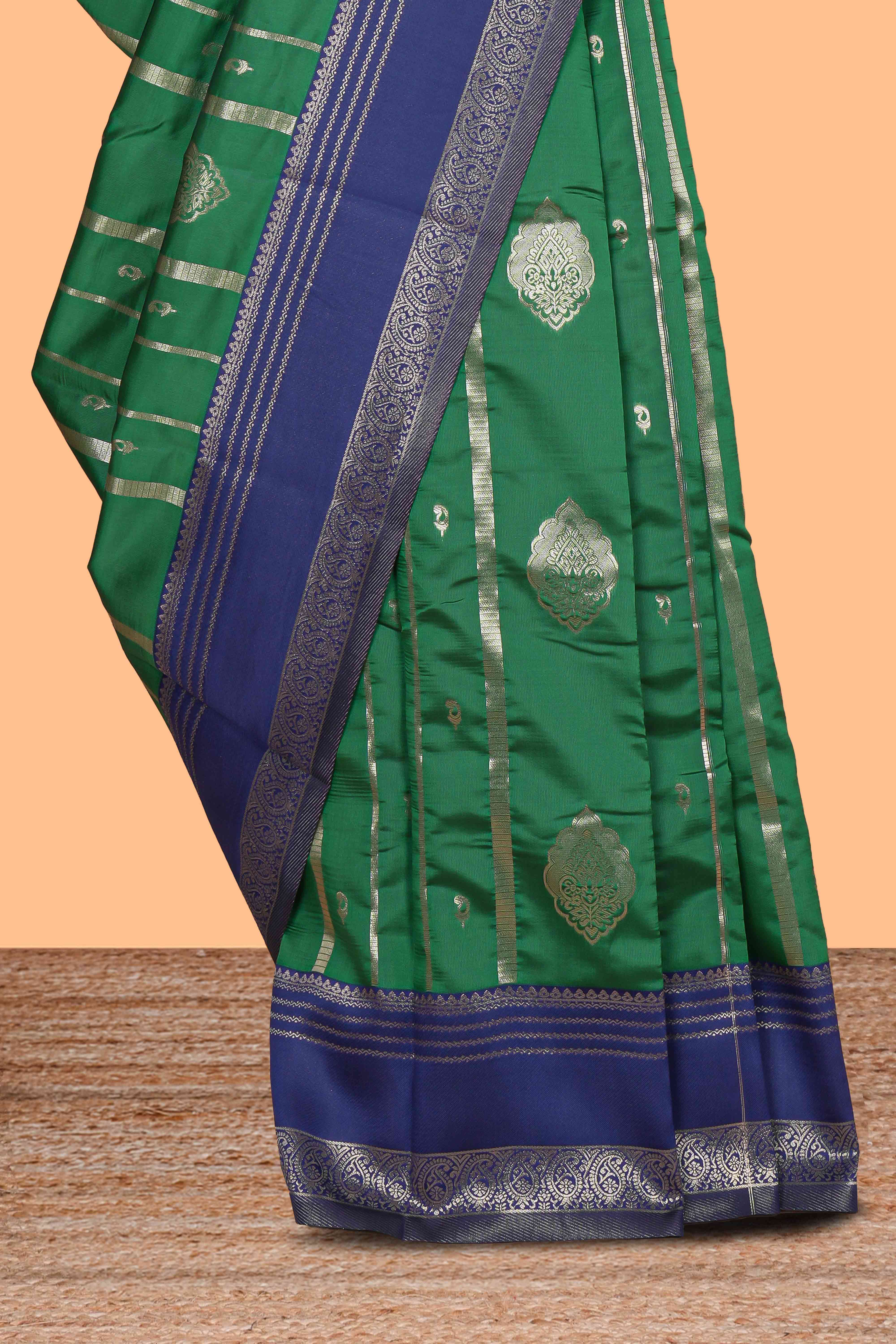 Green striped zari motifs design kota cotton saree with contrast zari border and motifs blouse