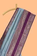 Light blue striped zari motifs design kota cotton saree with contrast zari border and motifs blouse