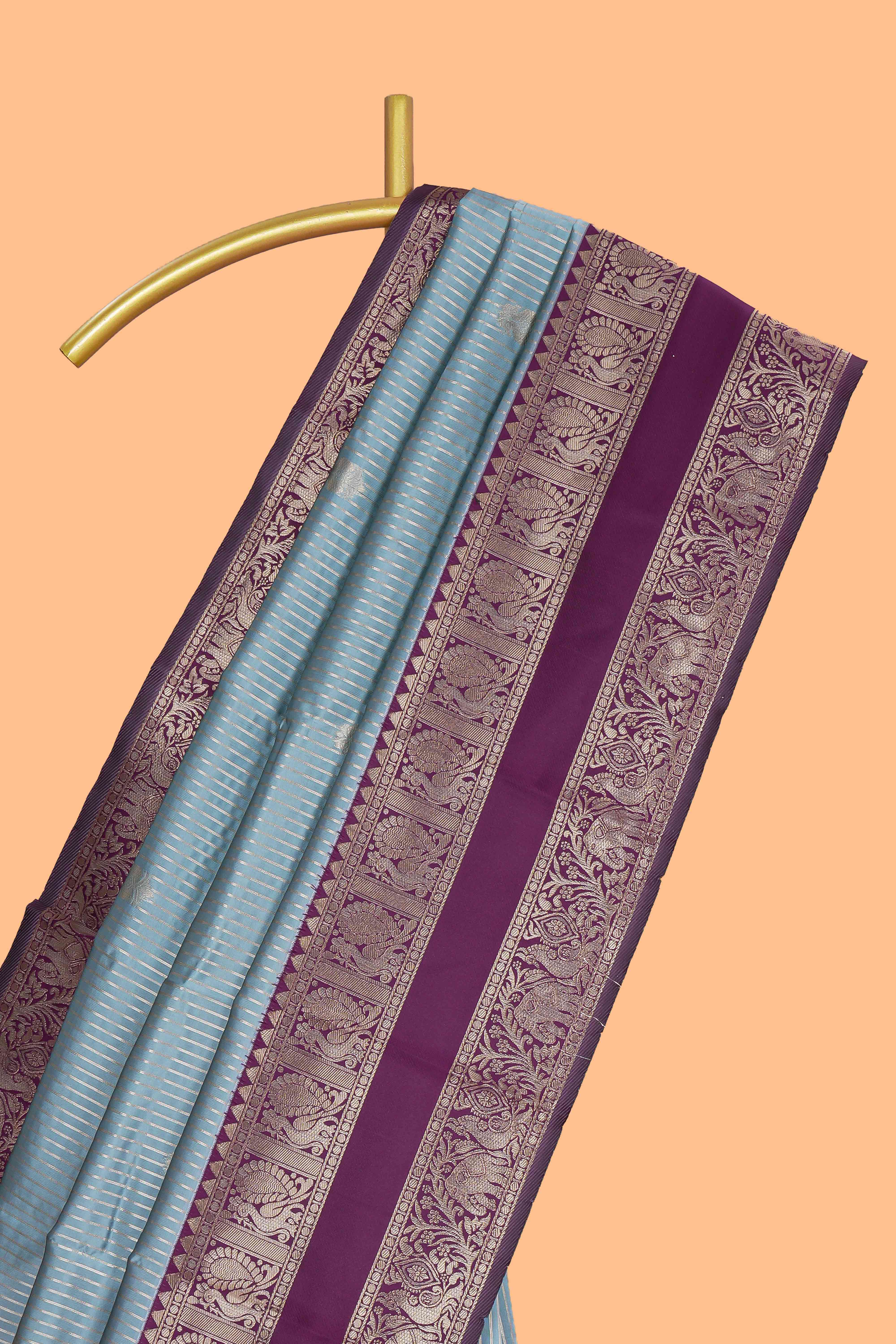 Light blue striped zari motifs design kota cotton saree with contrast zari border and motifs blouse