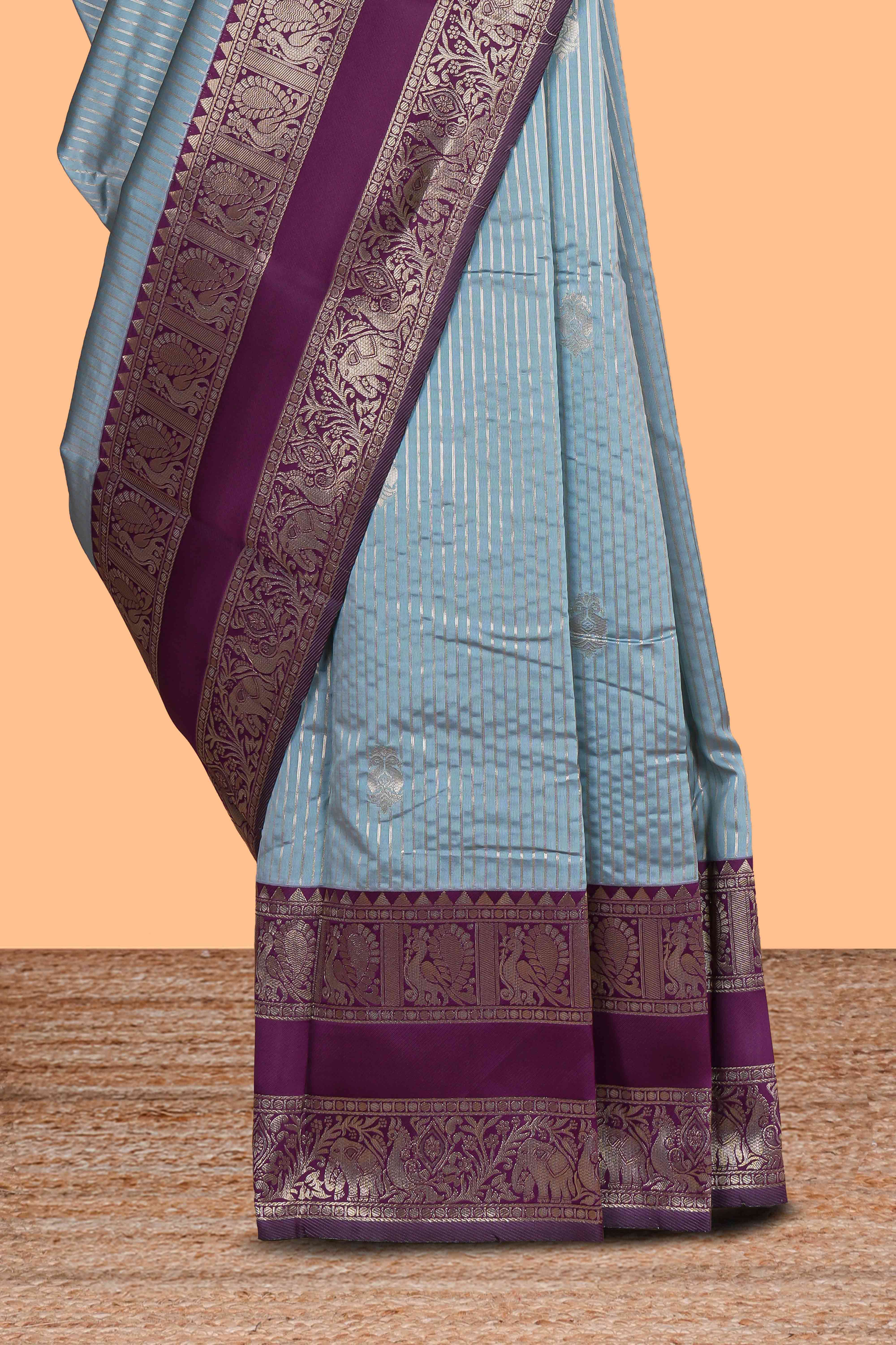 Light blue striped zari motifs design kota cotton saree with contrast zari border and motifs blouse